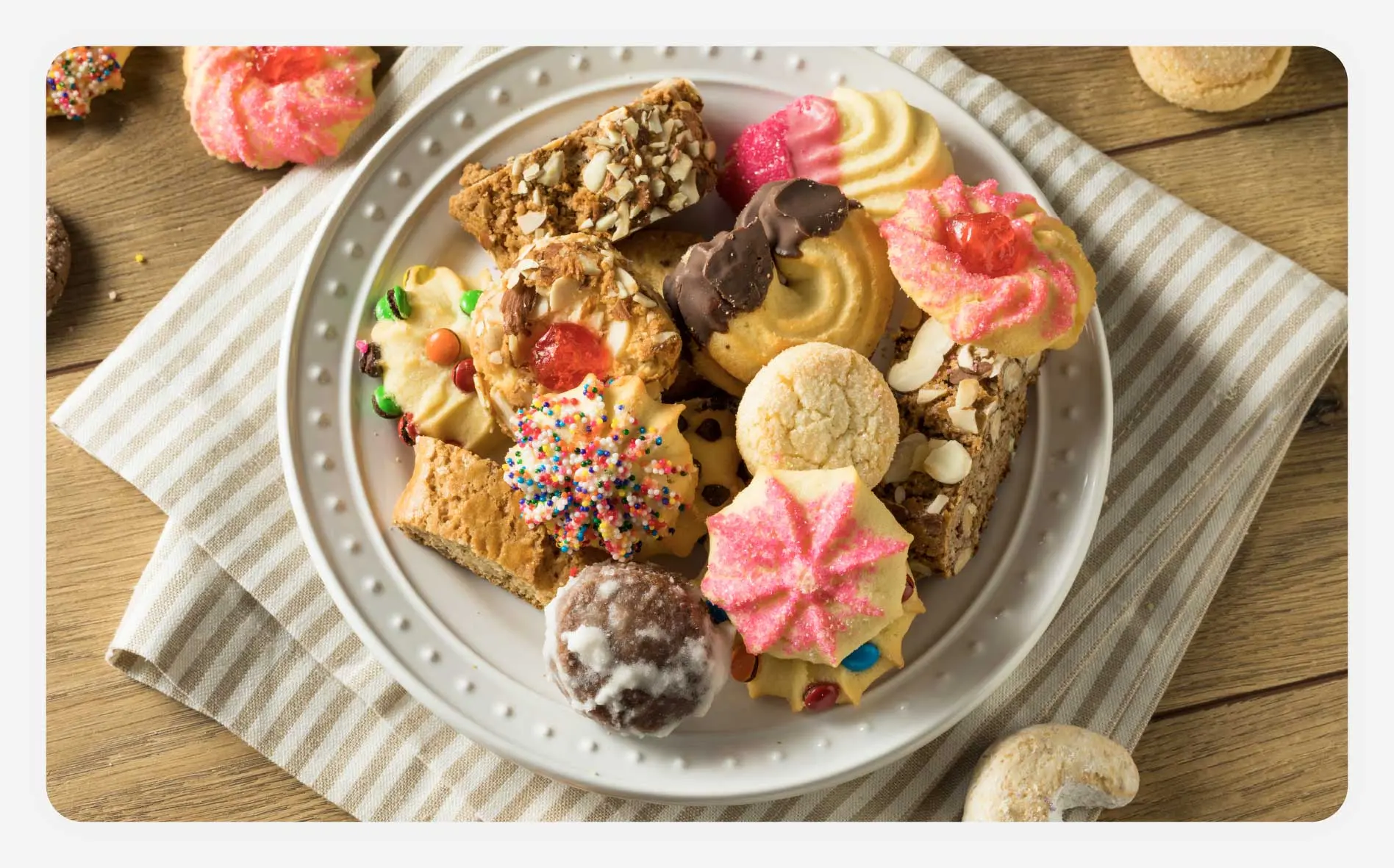 A plate of colorful sugar and chocolate cookies