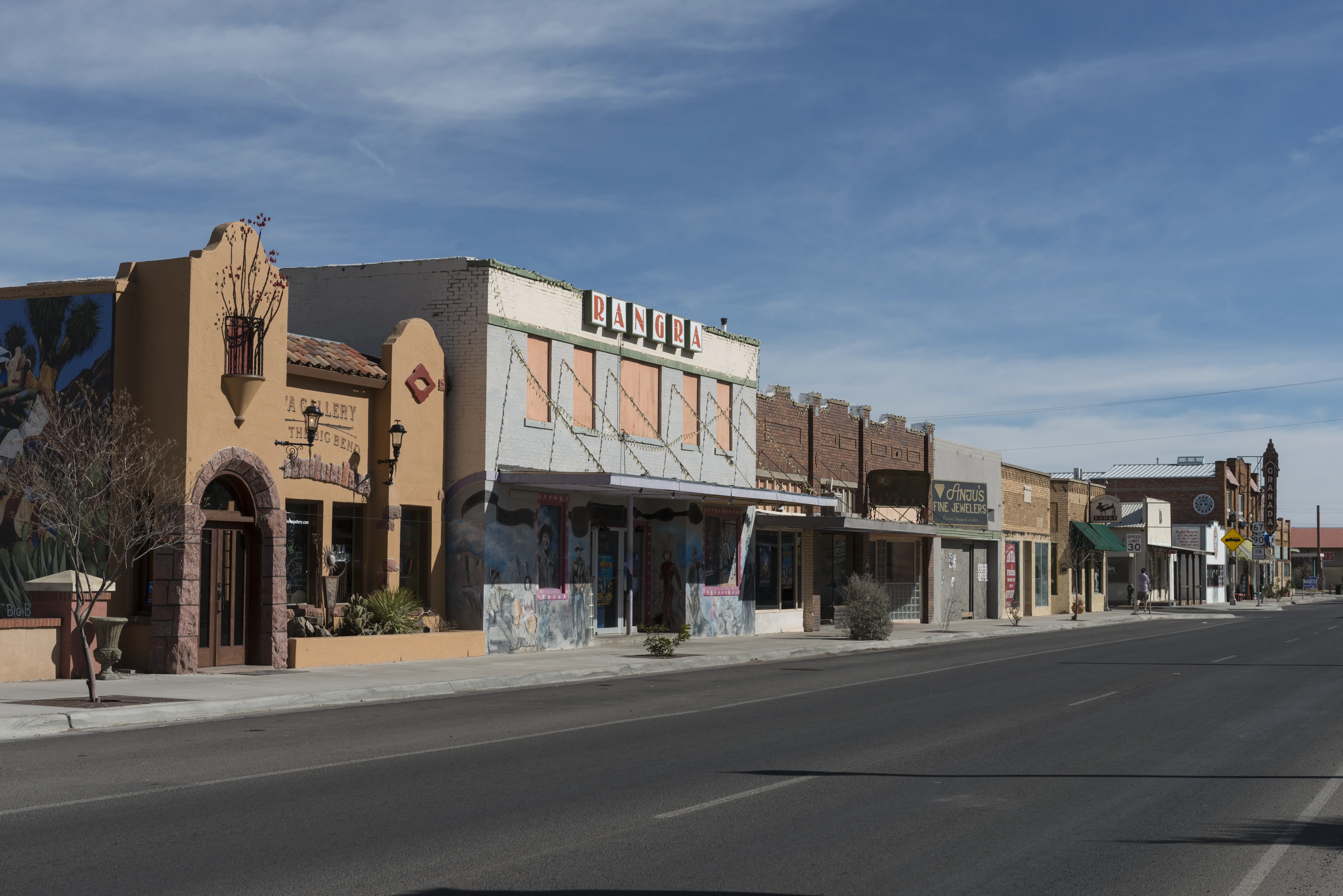 Image of some of the rustic downtown shops of Alpine, Texas.