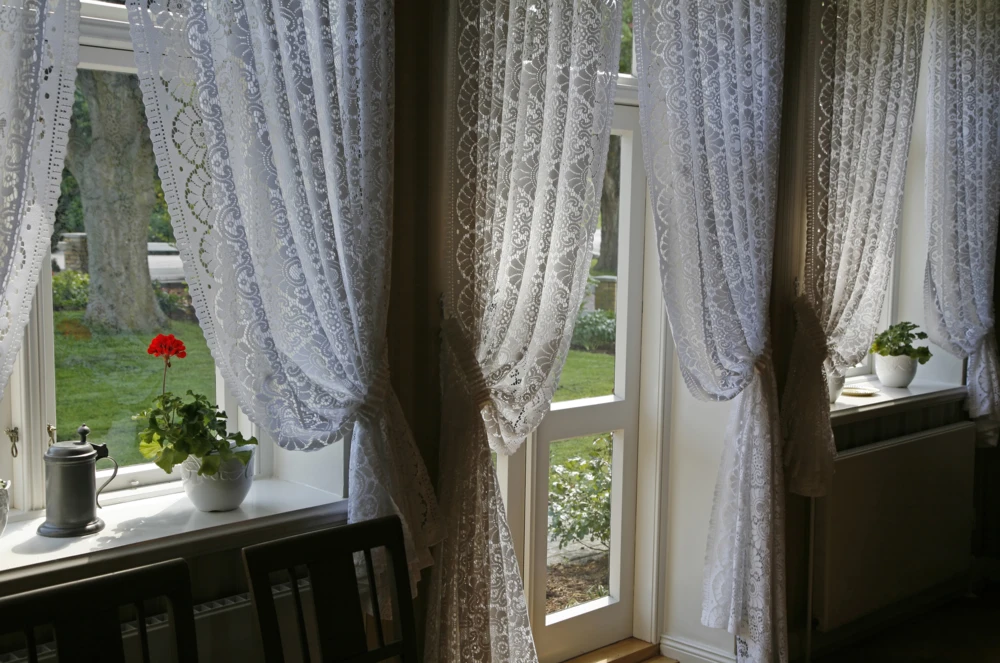White curtains over windows