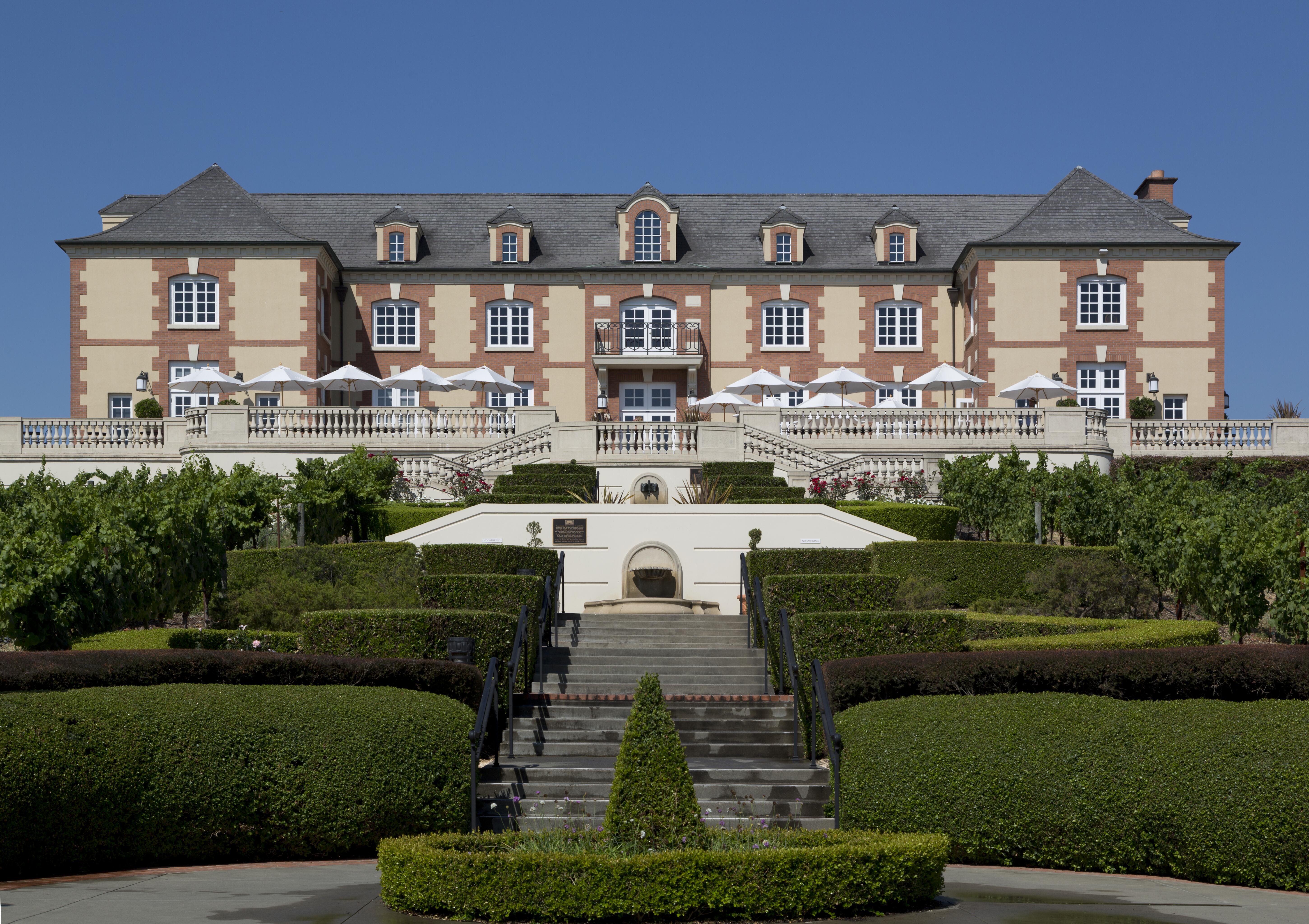 Exterior image of the building and grounds of Domaine Carneros winery and chateau.