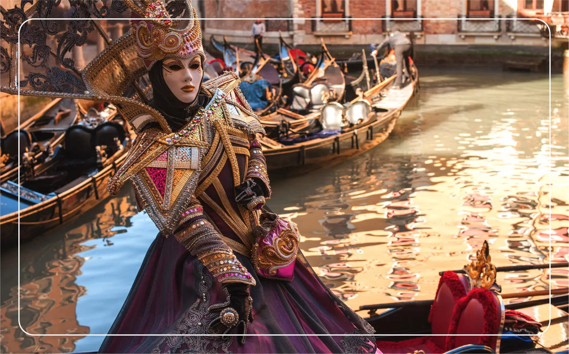Performers at the Carnevale di Venezia in gondolas.