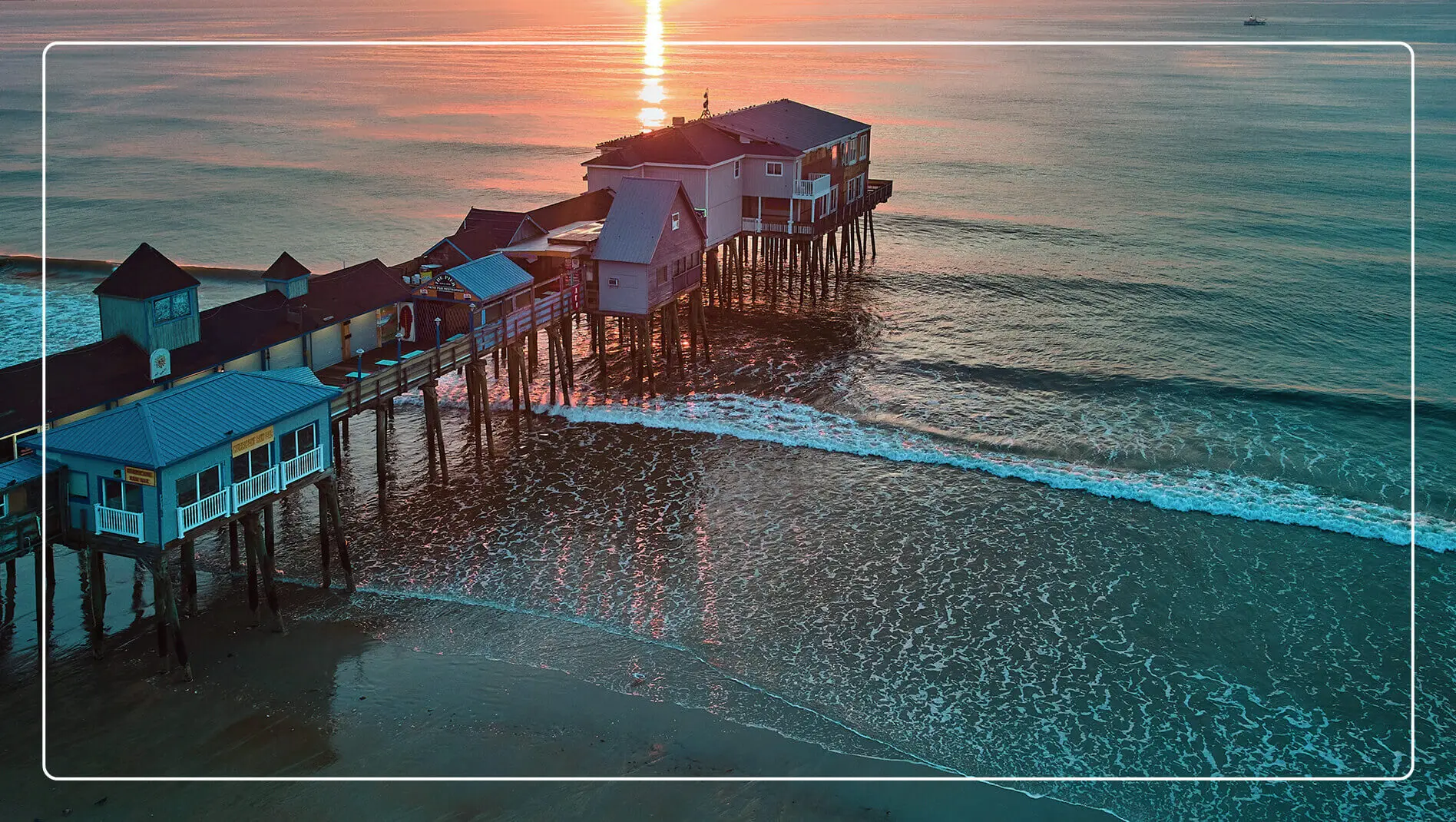 The pier extended into the water on Old Orchard Beach.