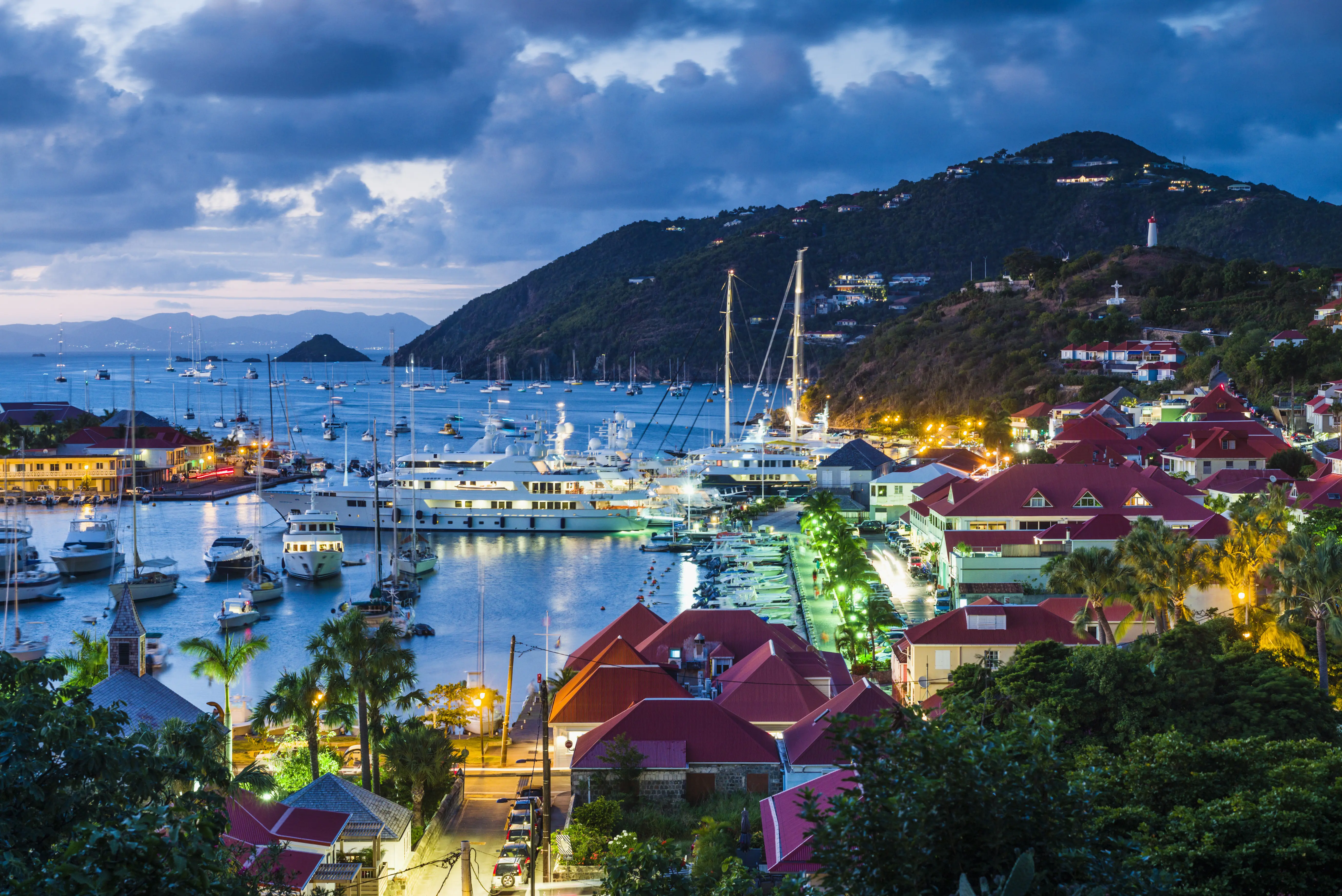 Image of a harbor in St. Barts at dusk.
