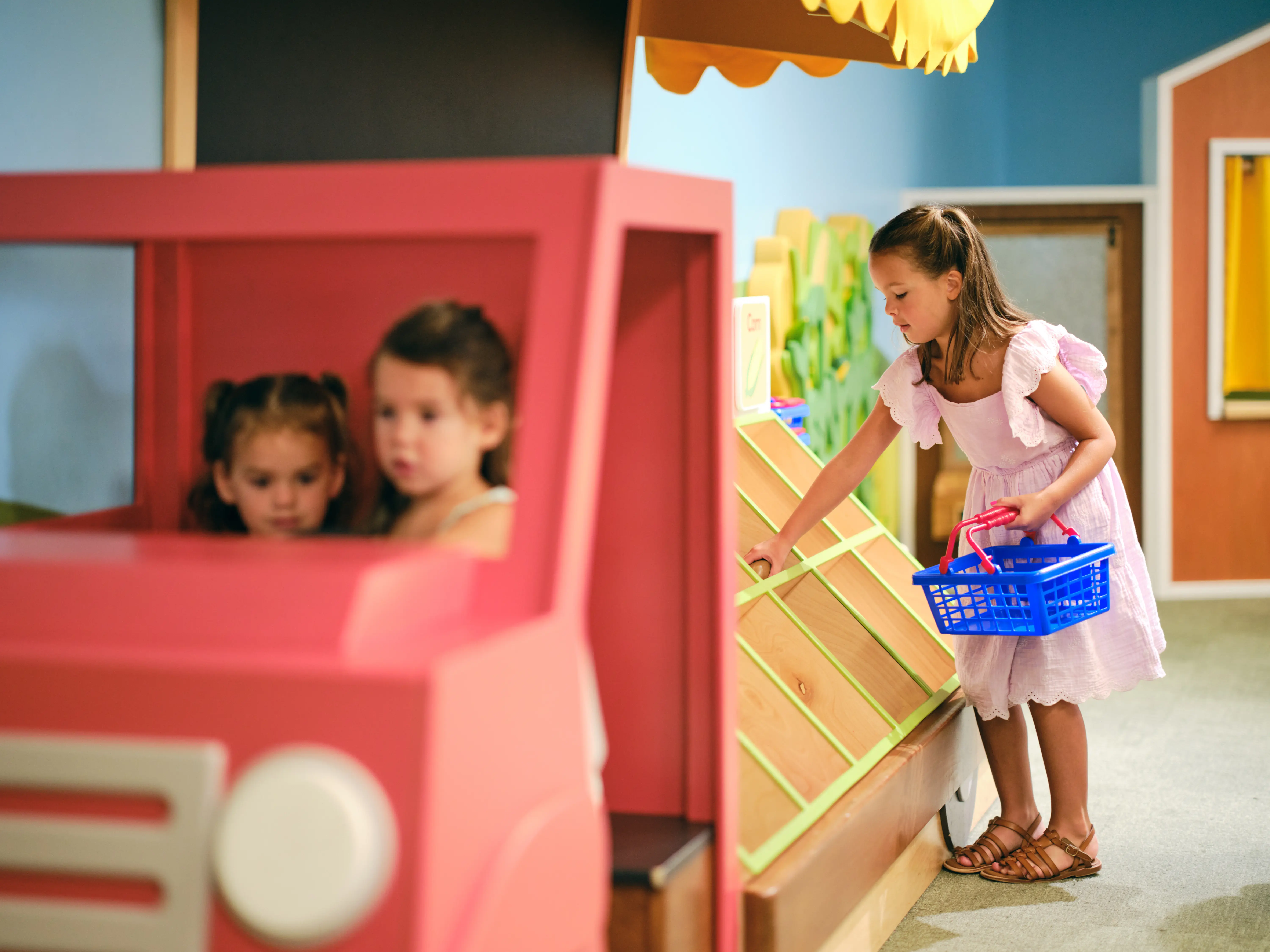 Image of children playing in a children's museum.