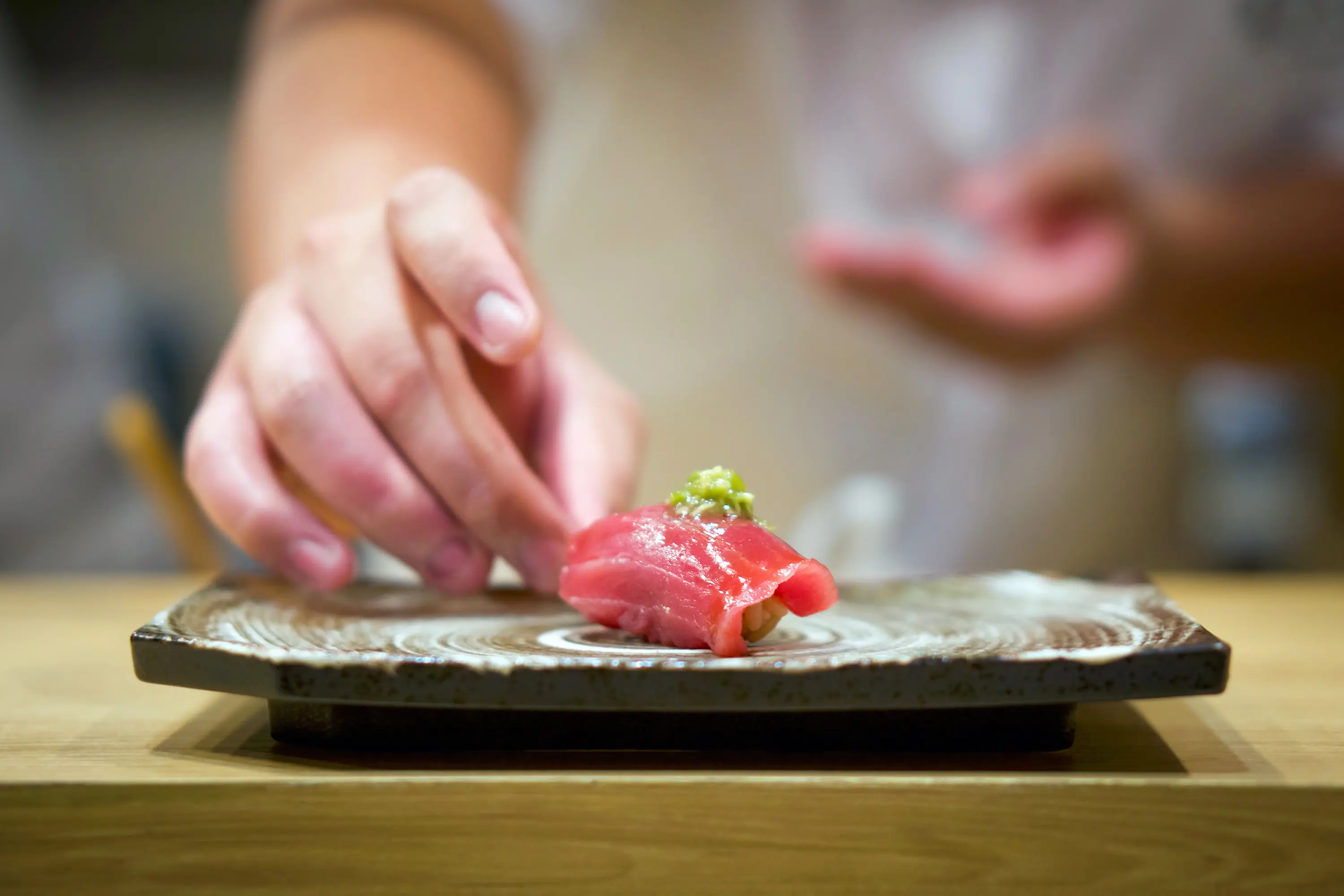Omakase tuna nigiri with fresh wasabi