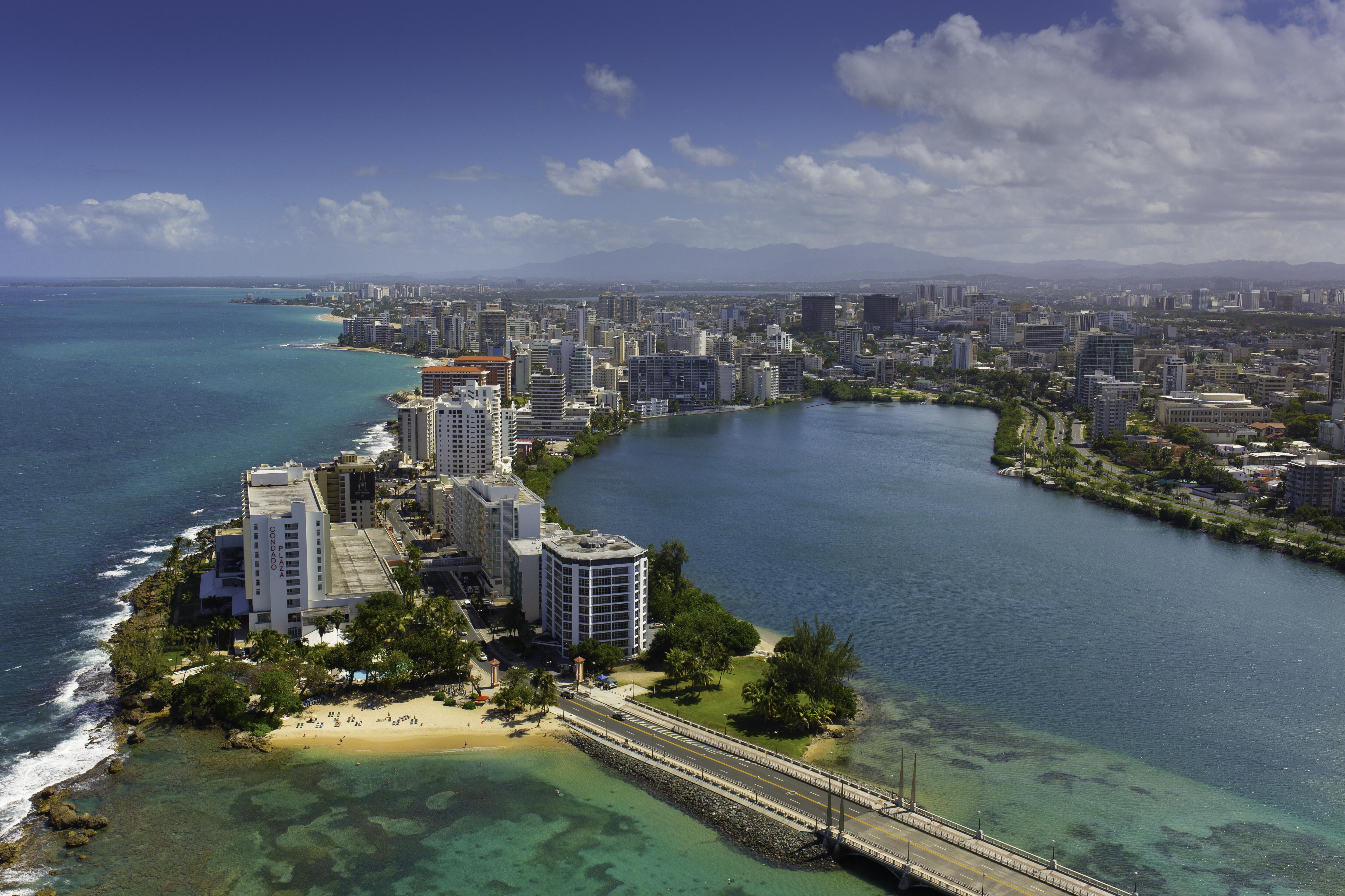 Image of hotels lining Condado Lagoon and Atlantic Ocean San Juan, Puerto Rico.