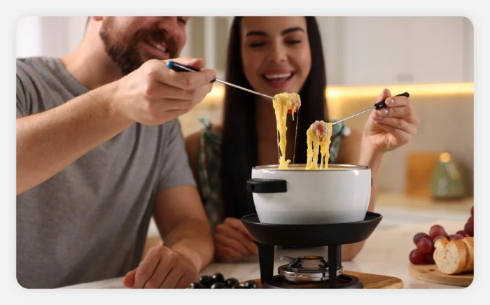 A couple eating fondue 