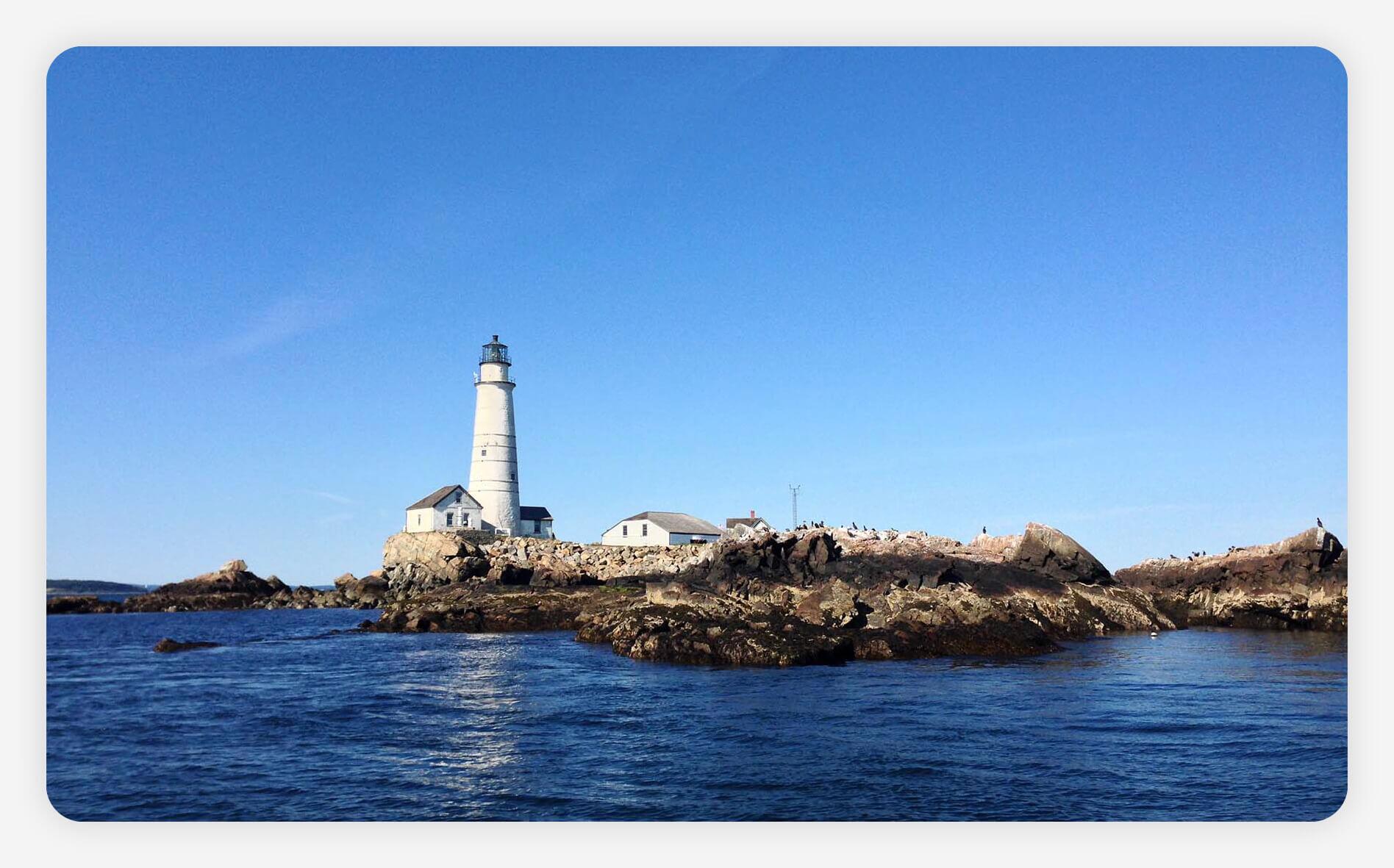A view of a lighthouse on one of the Boston Harbor Islands.
