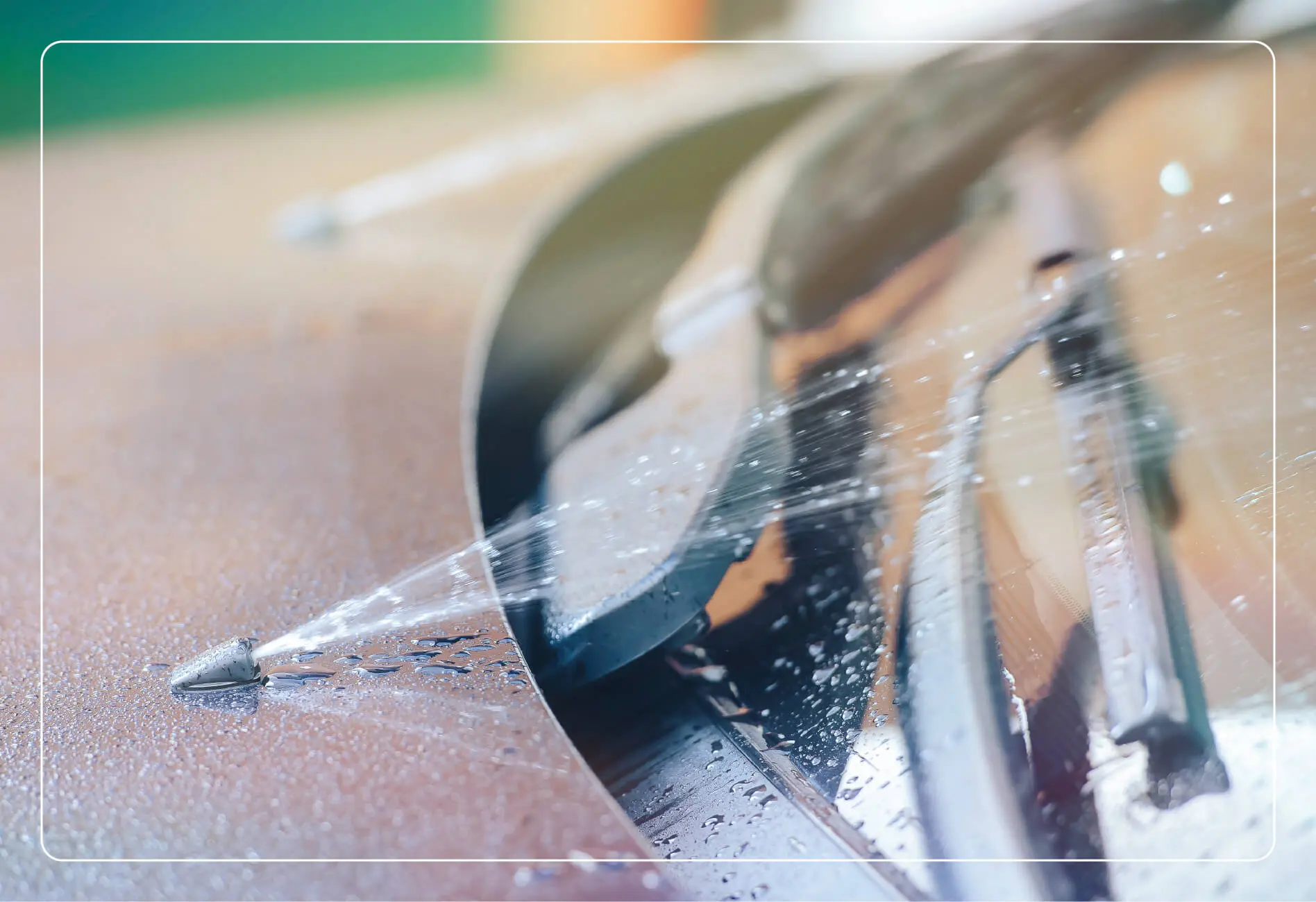 washer fluid spraying on a windshield