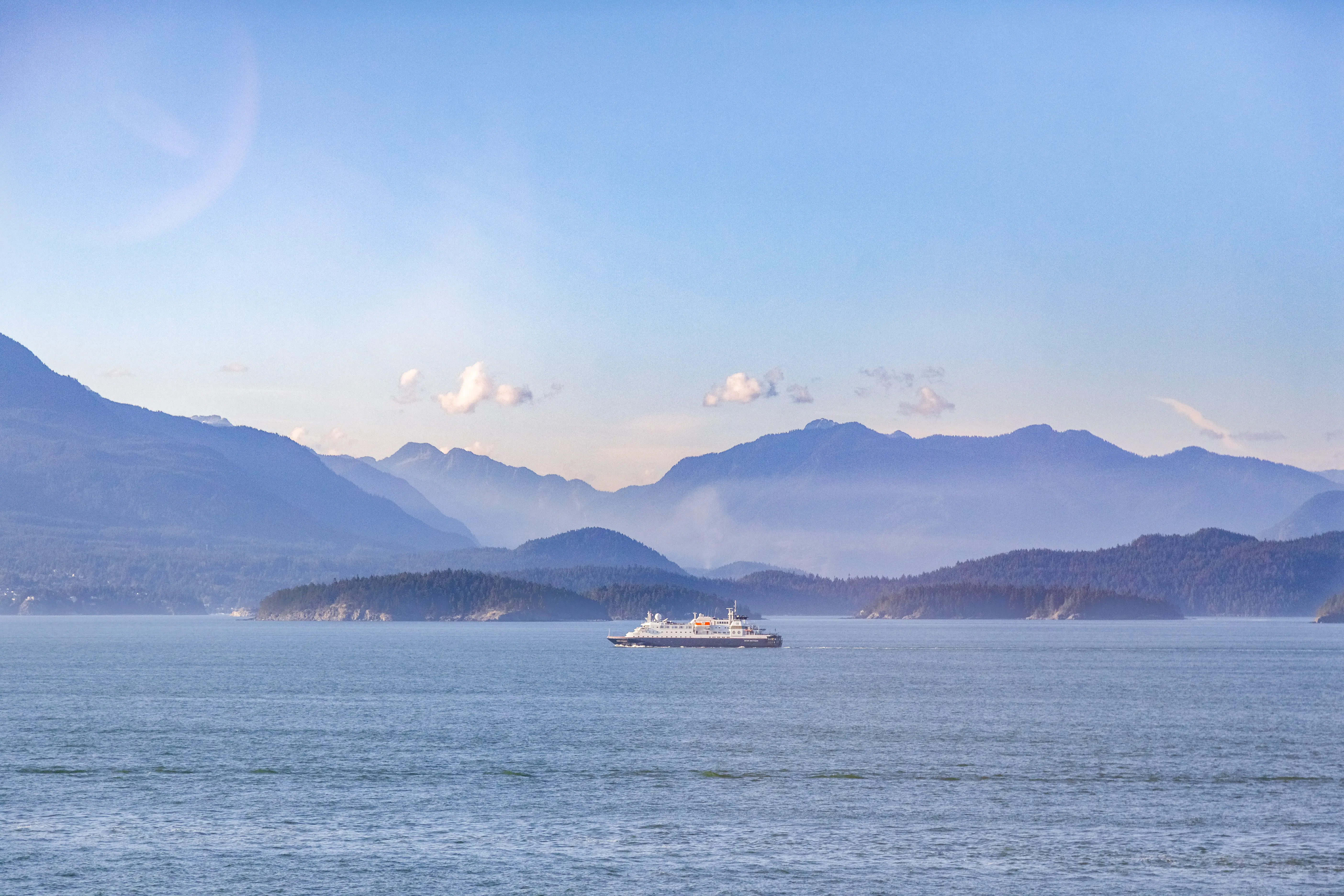 Image of a cruise ship sailing the waters of British Columbia, Vancouver, Canada.