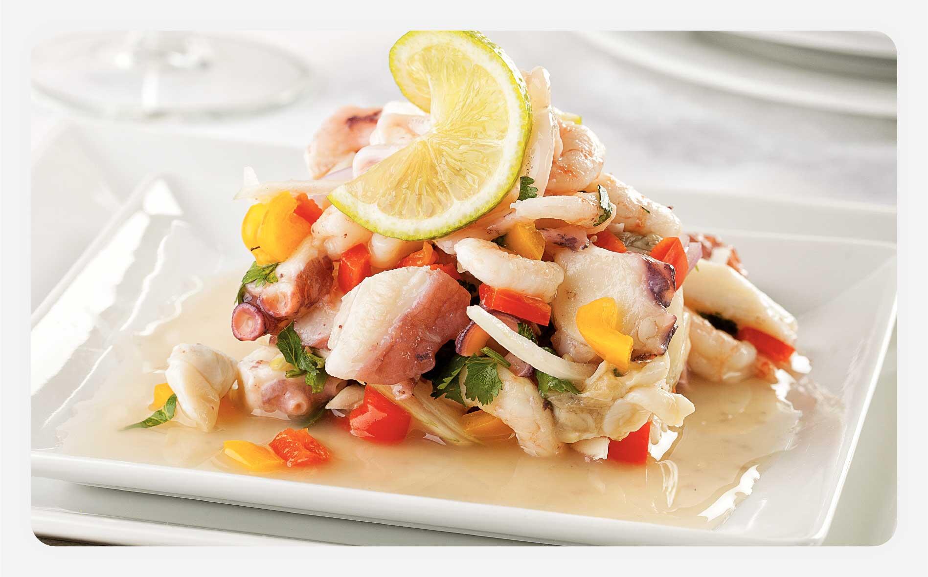 A plate of fresh ceviche on a table
