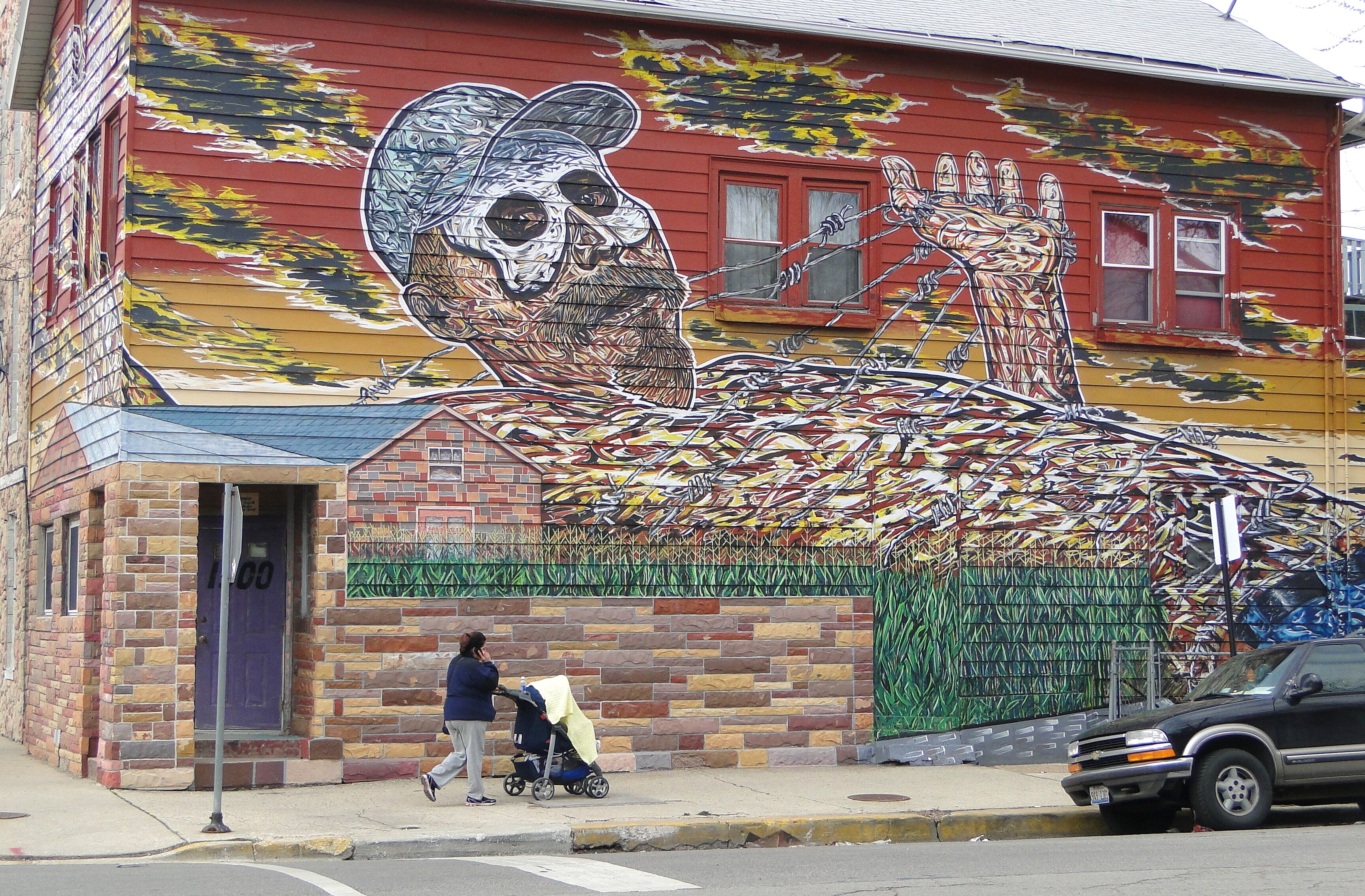 Image of street art on the side of a building in Pilsen, Chicago.