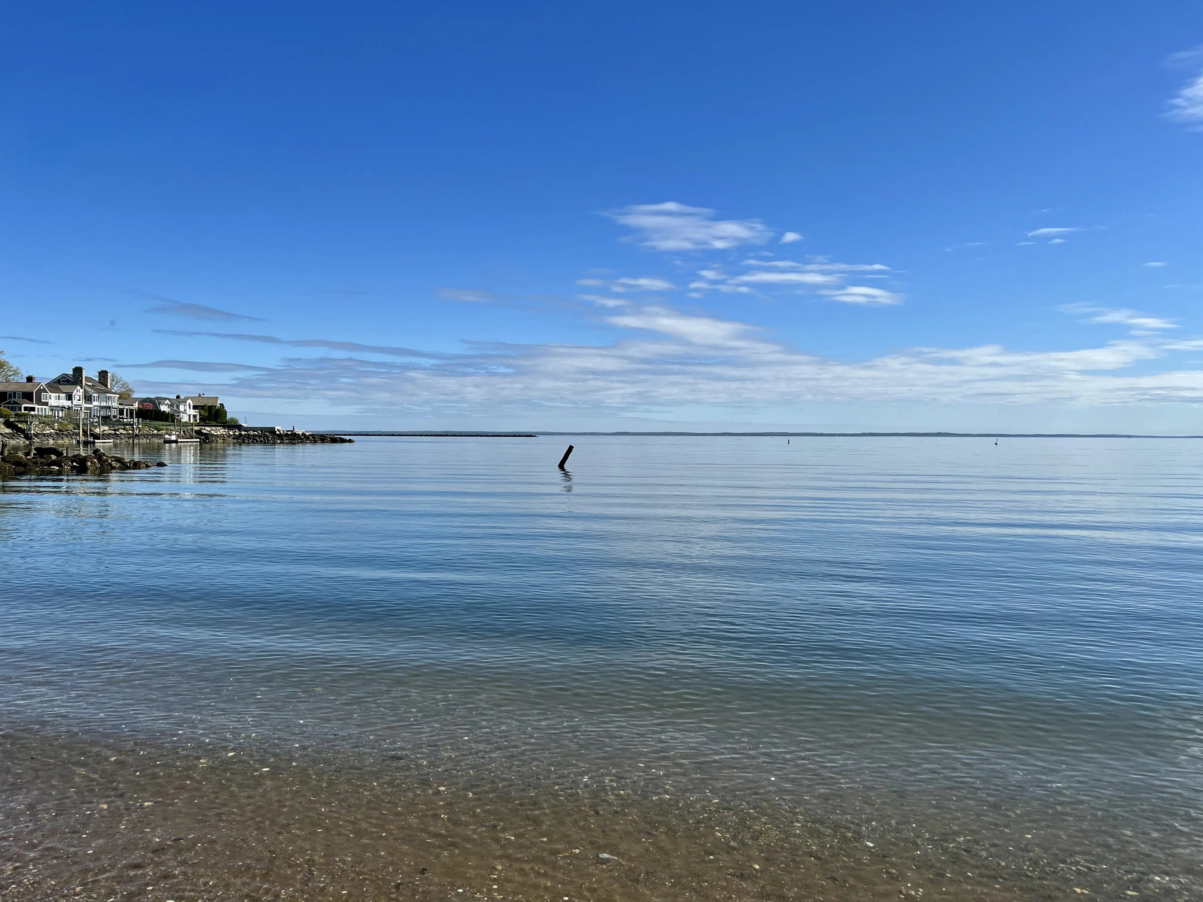 Image of a calm shoreline at the Great Peconic Bay.