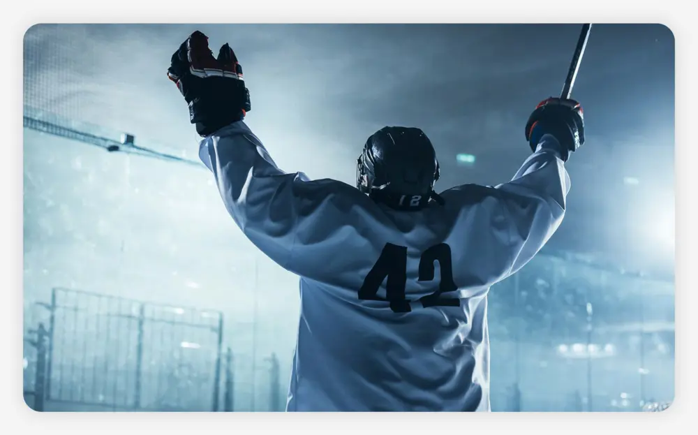 Professional ice hockey player celebrating a victory