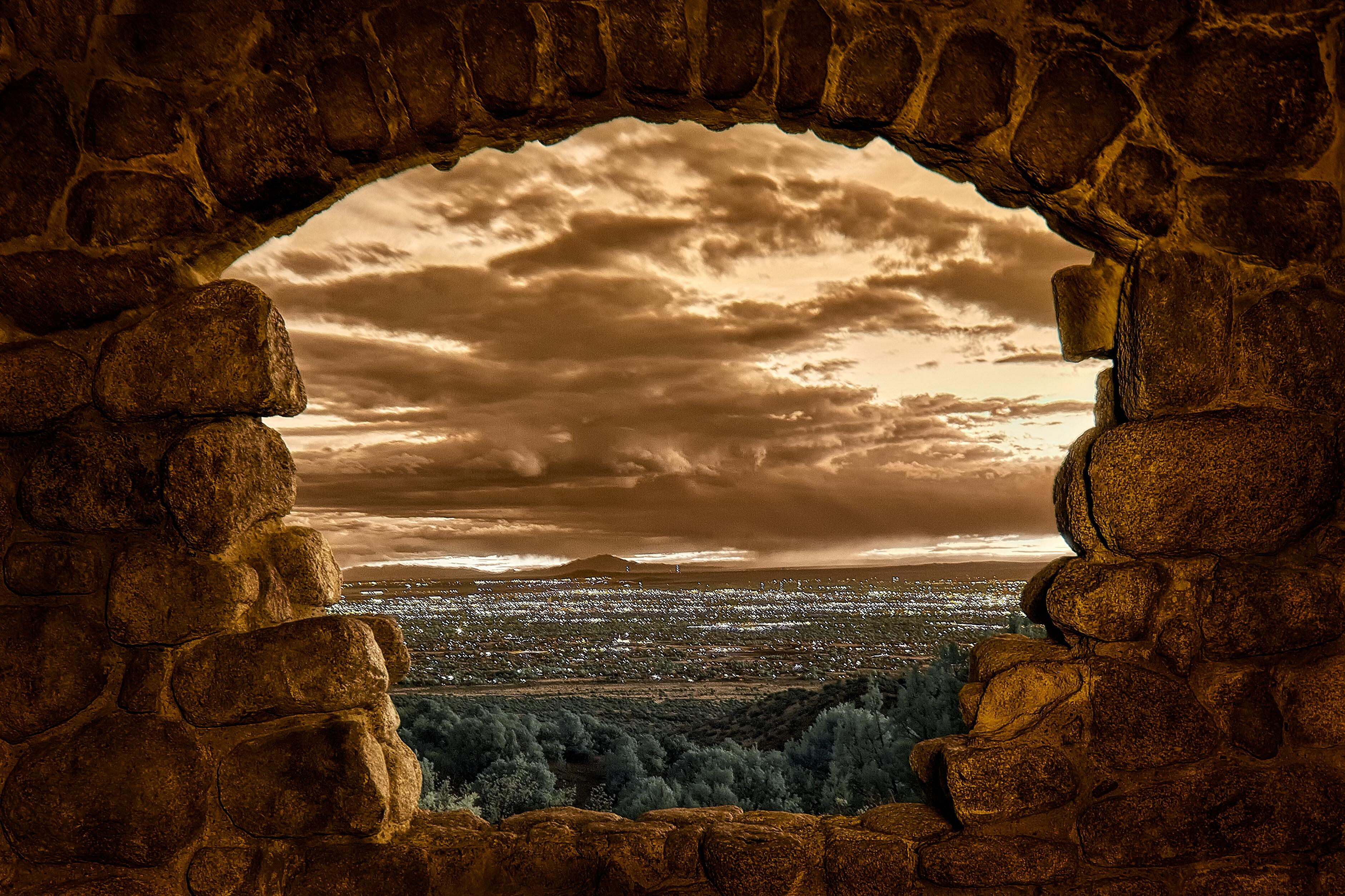 This photo of Albuquerque, New Mexico, was taken from inside one of the rock houses on the Sandia Mountains.