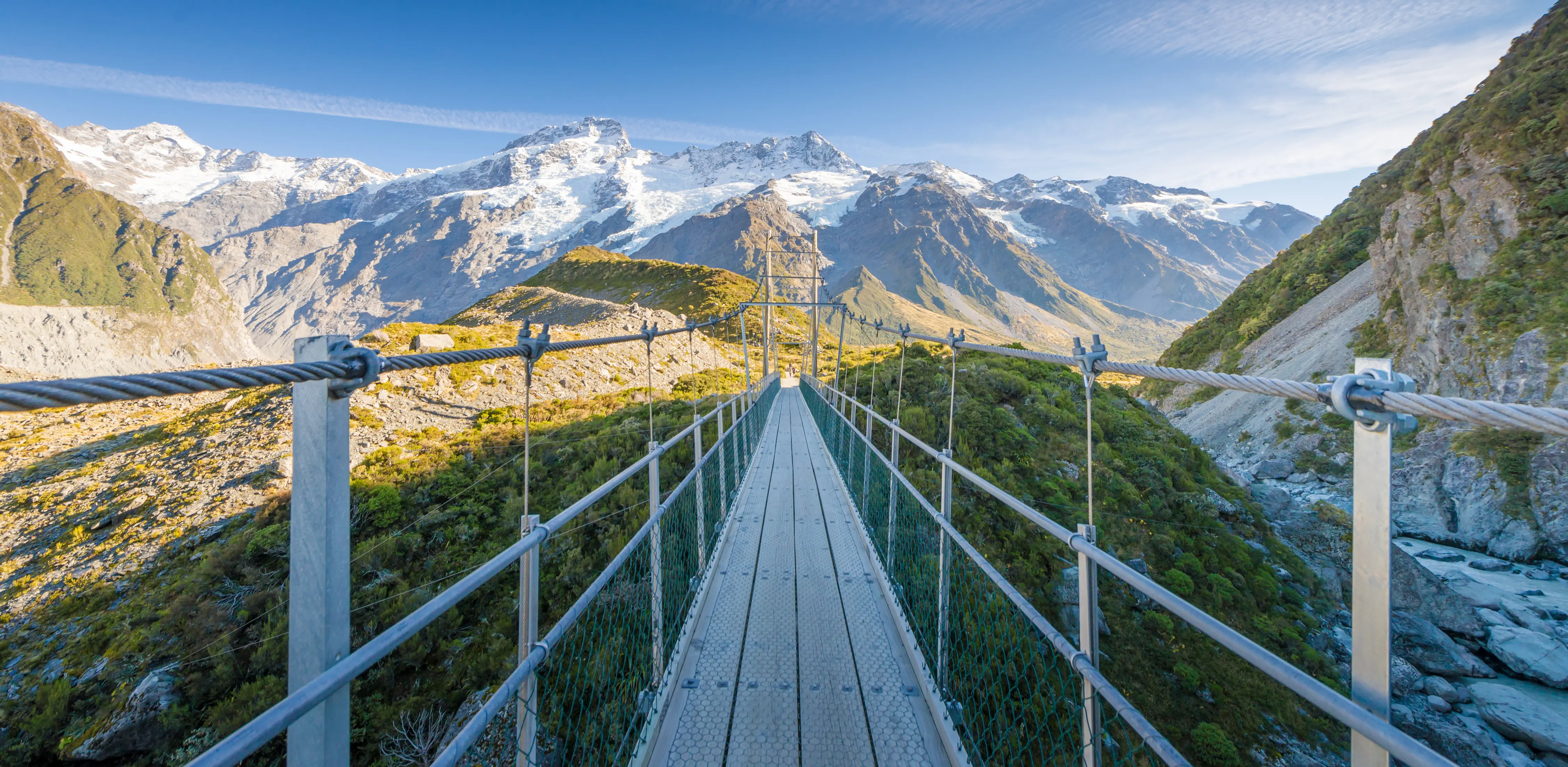Young traveler taking photo at mt cook famous destination in new zealand