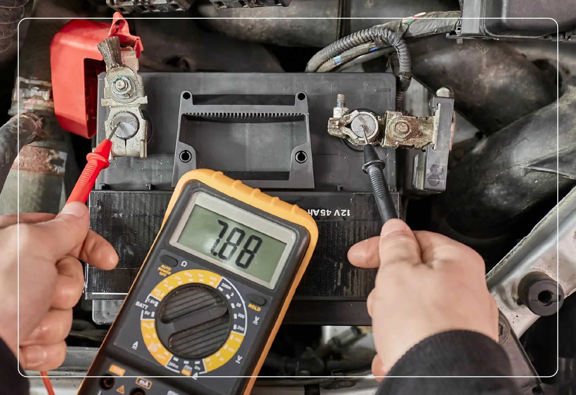 A person trying to run a diagnostic test on a car alternator.