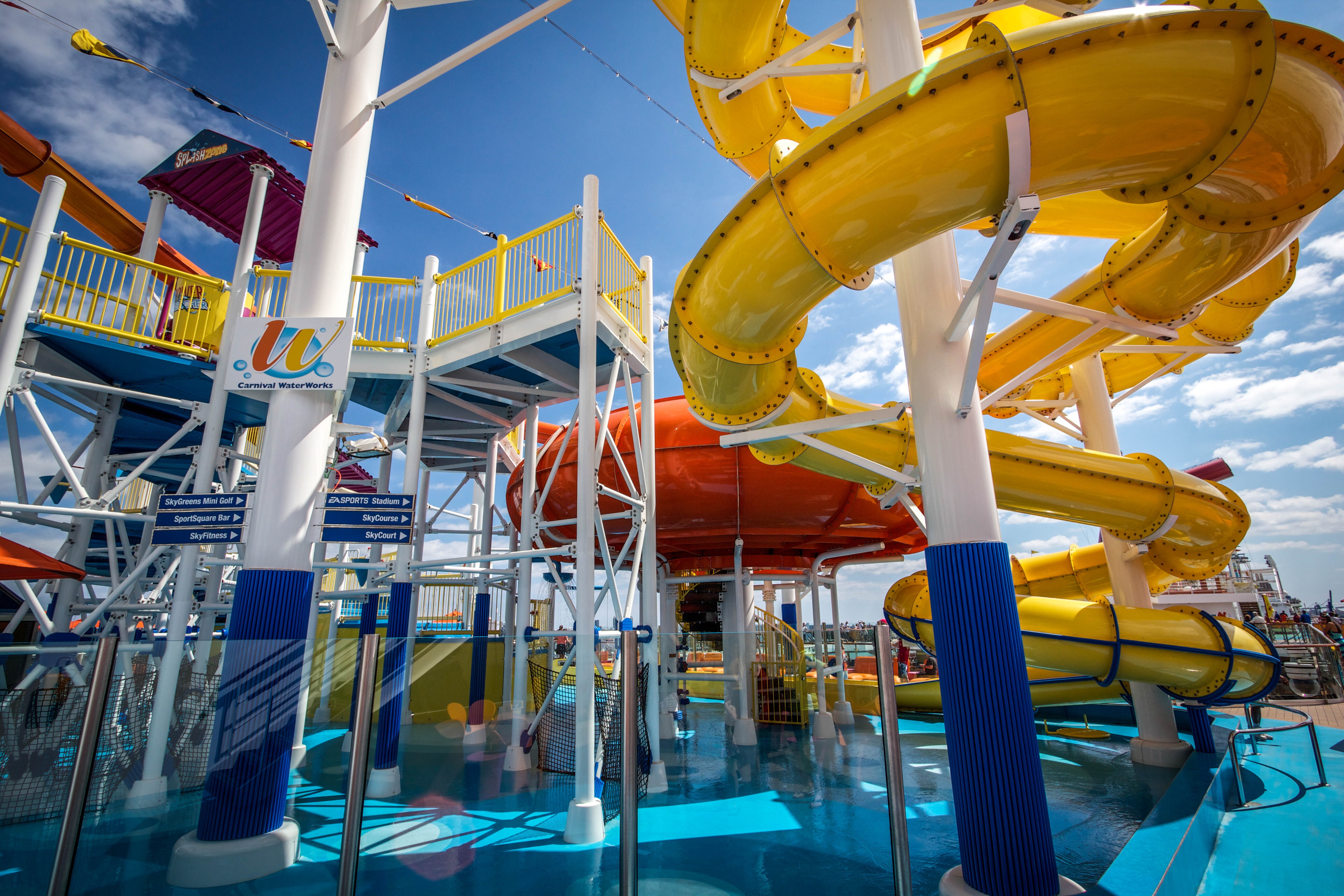Colorful water slides in a water park on a Carnival cruise ship.
