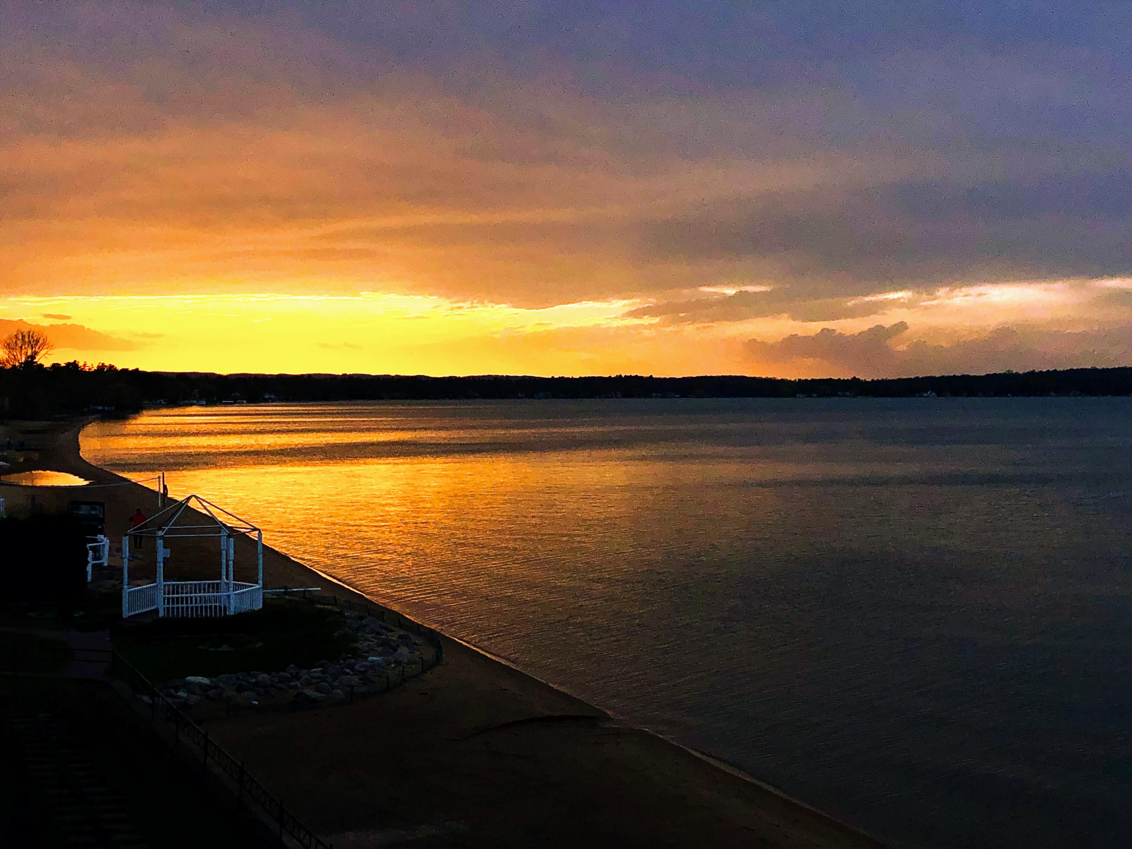 Image of a sunset on the beach at Traverse City.