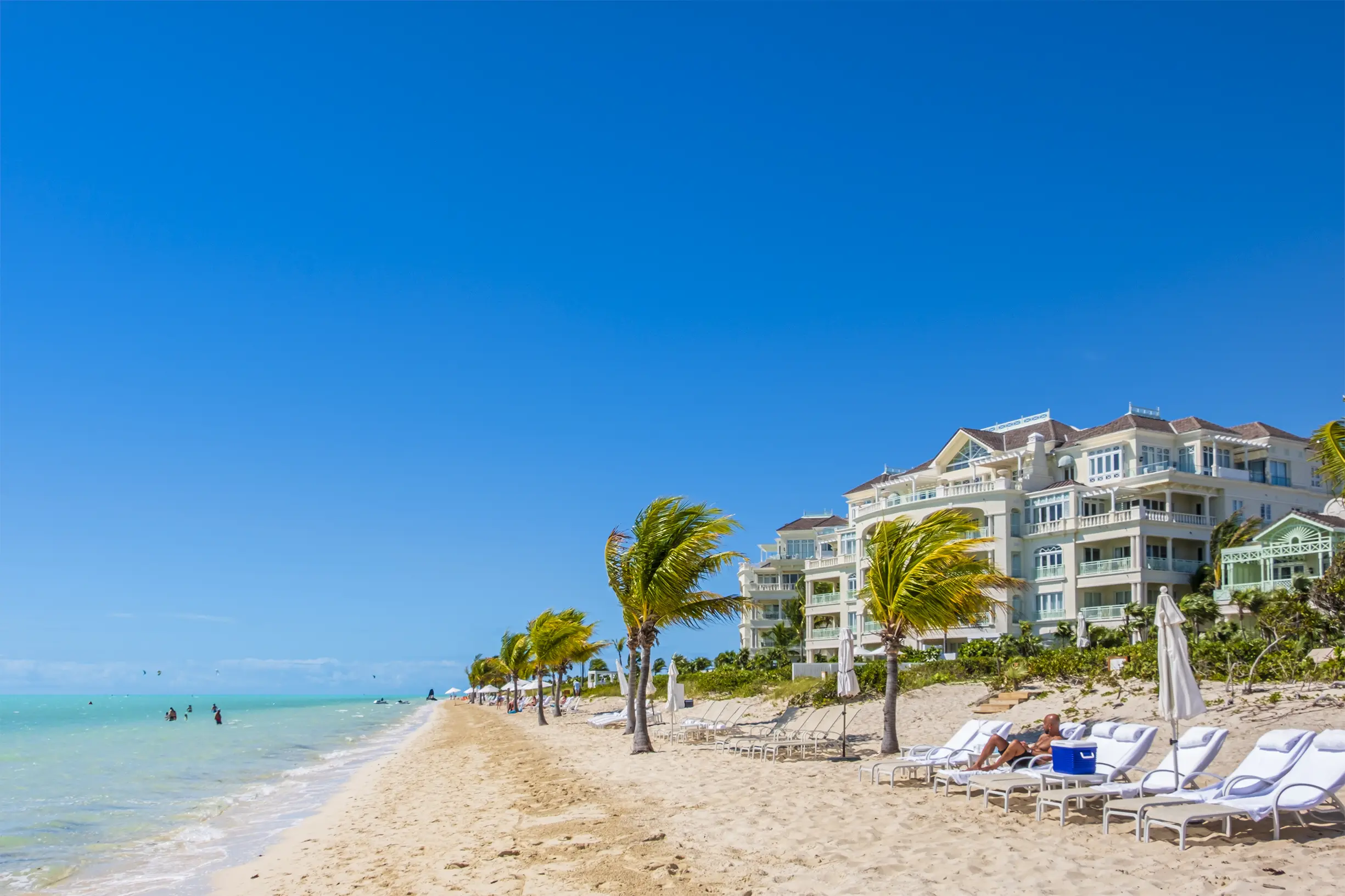 Image of a hotel by the shore in Turks and Caicos.