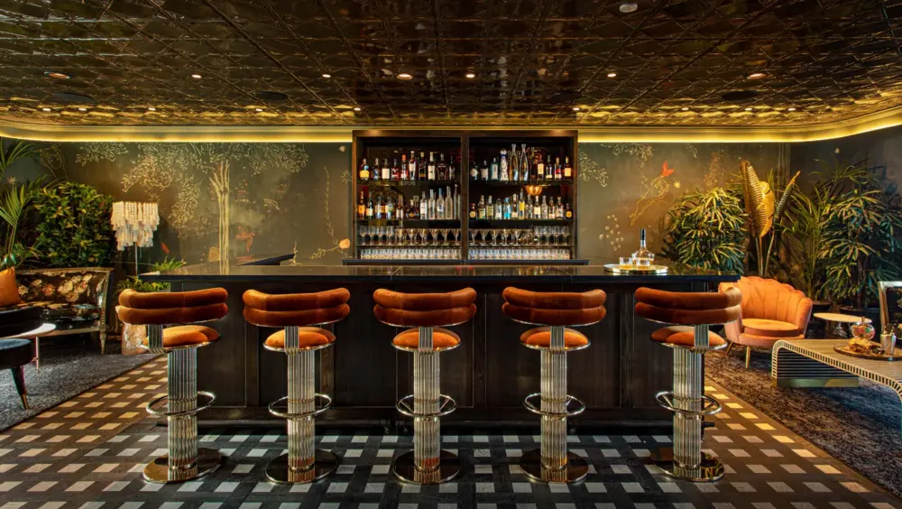 The bar at Darling Rooftop Lounge, one of the best rooftop bars in New York City.