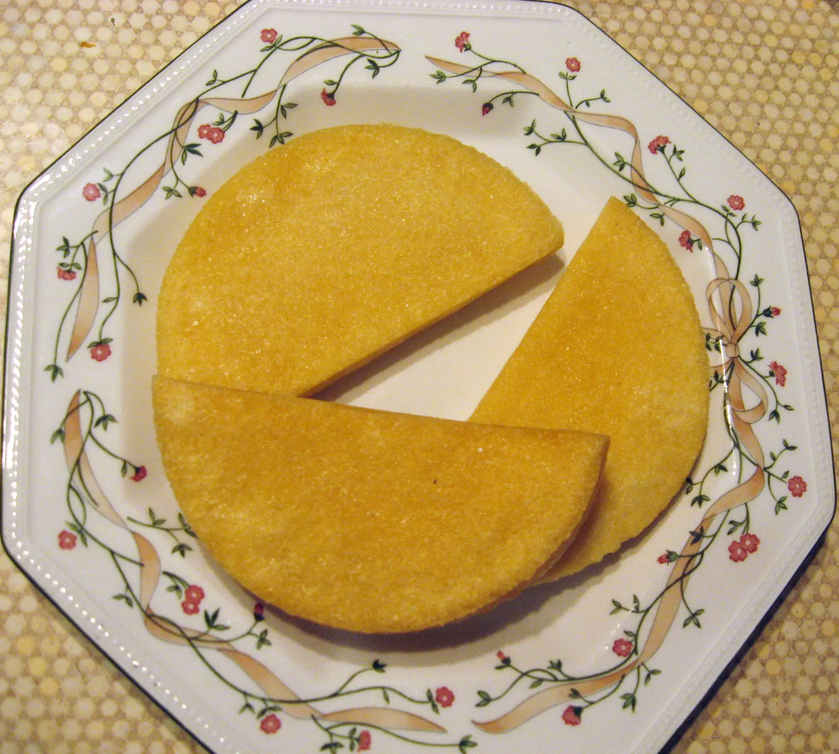 Image of a plate of Jamaican Bammies, a flatbread dish.