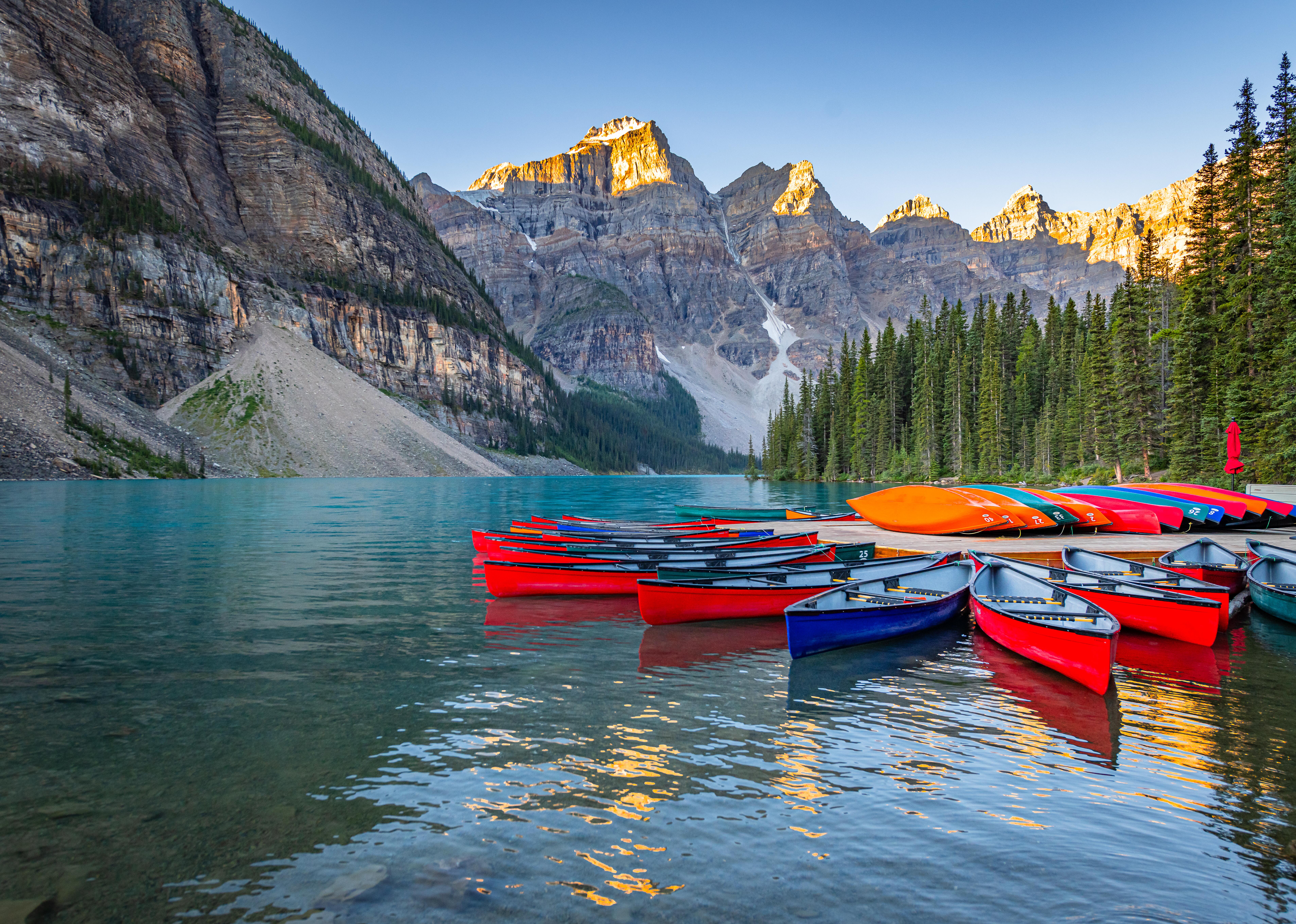 Photo of Canoes on Moraine lake Banff, Canada