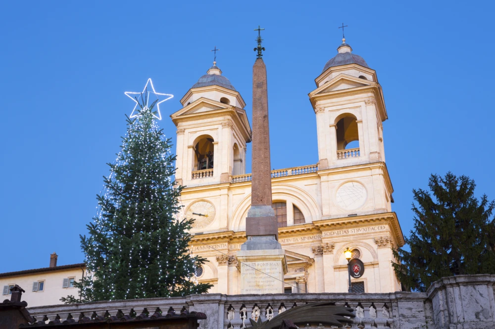 Christmas tree in front Trinit√† dei Monti at the Spanish steps in Rome, Italy