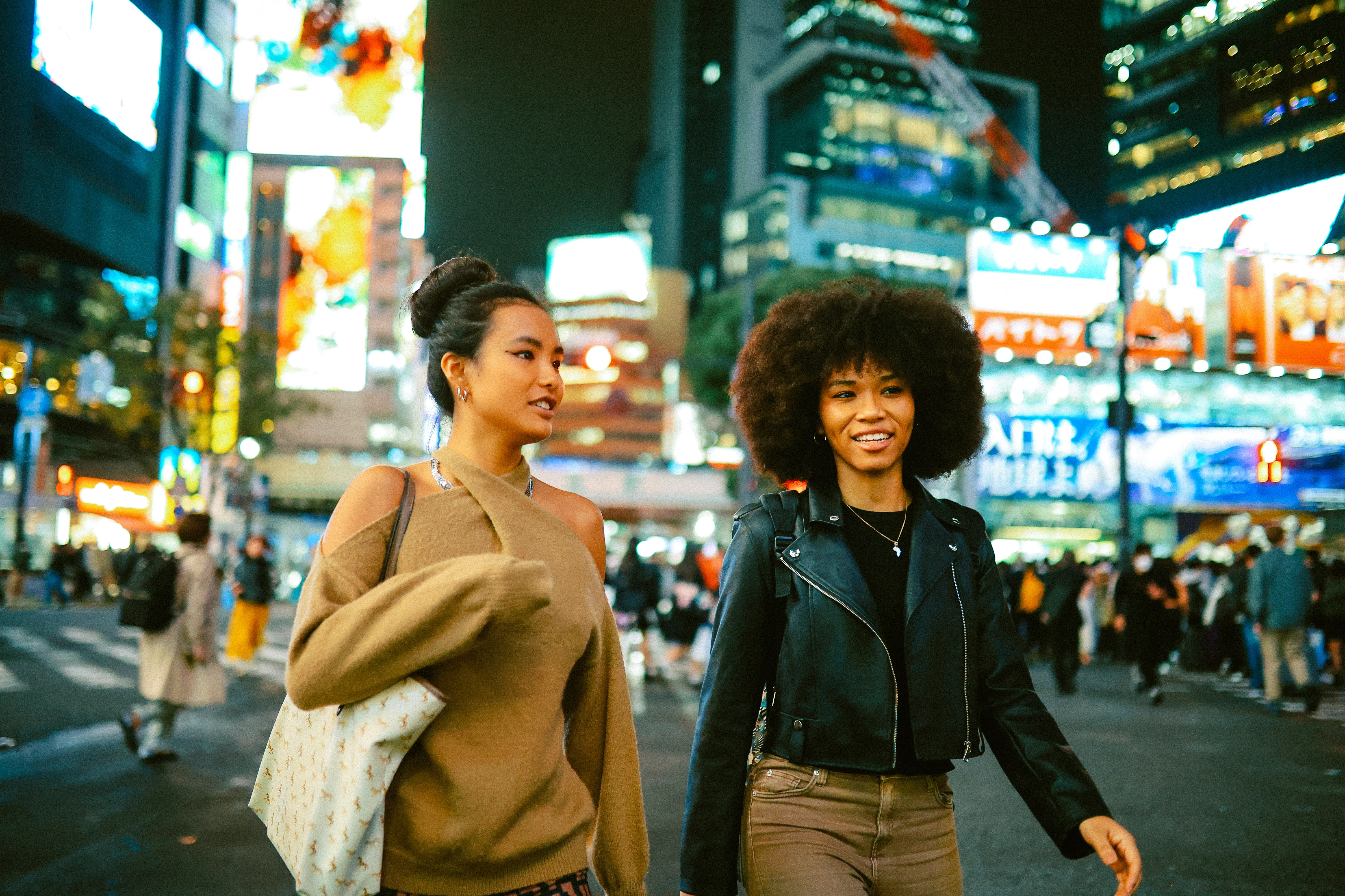 Female friends walking in Shibuya