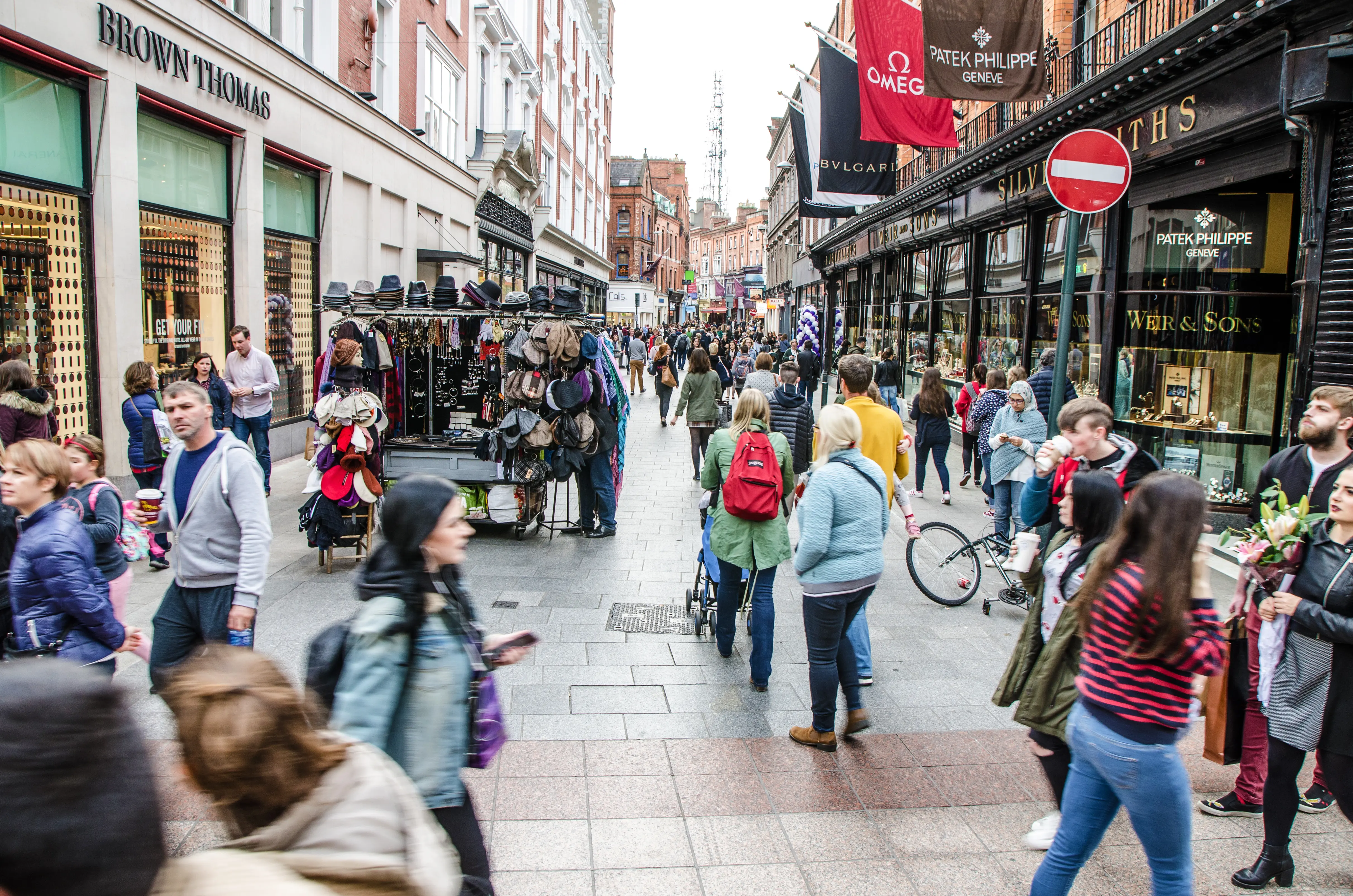 Tourists walking and shopping on Grafton Street in Dublin
