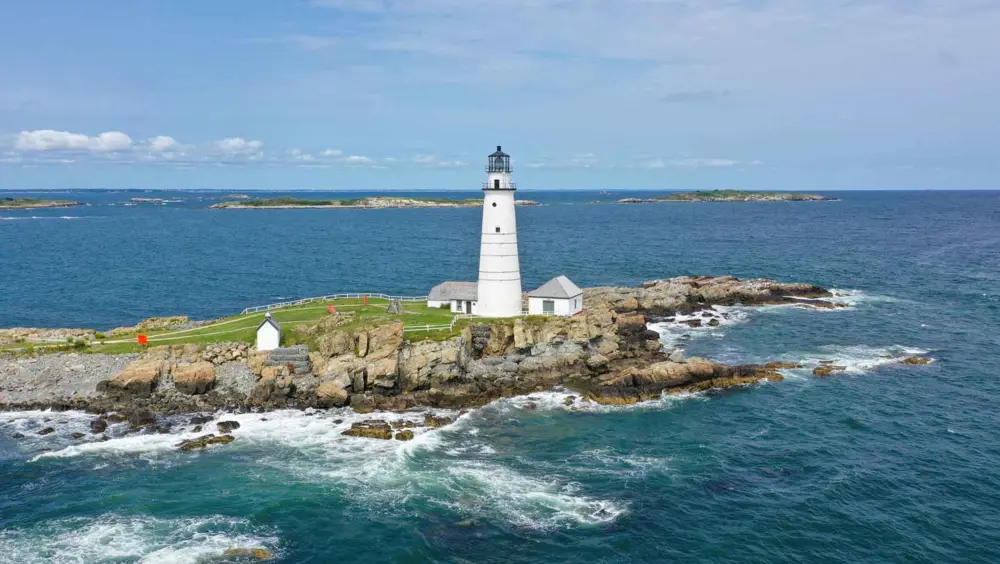 Zoomed-out view of the Boston Light at Little Brewster Island in the Boston Harbor.