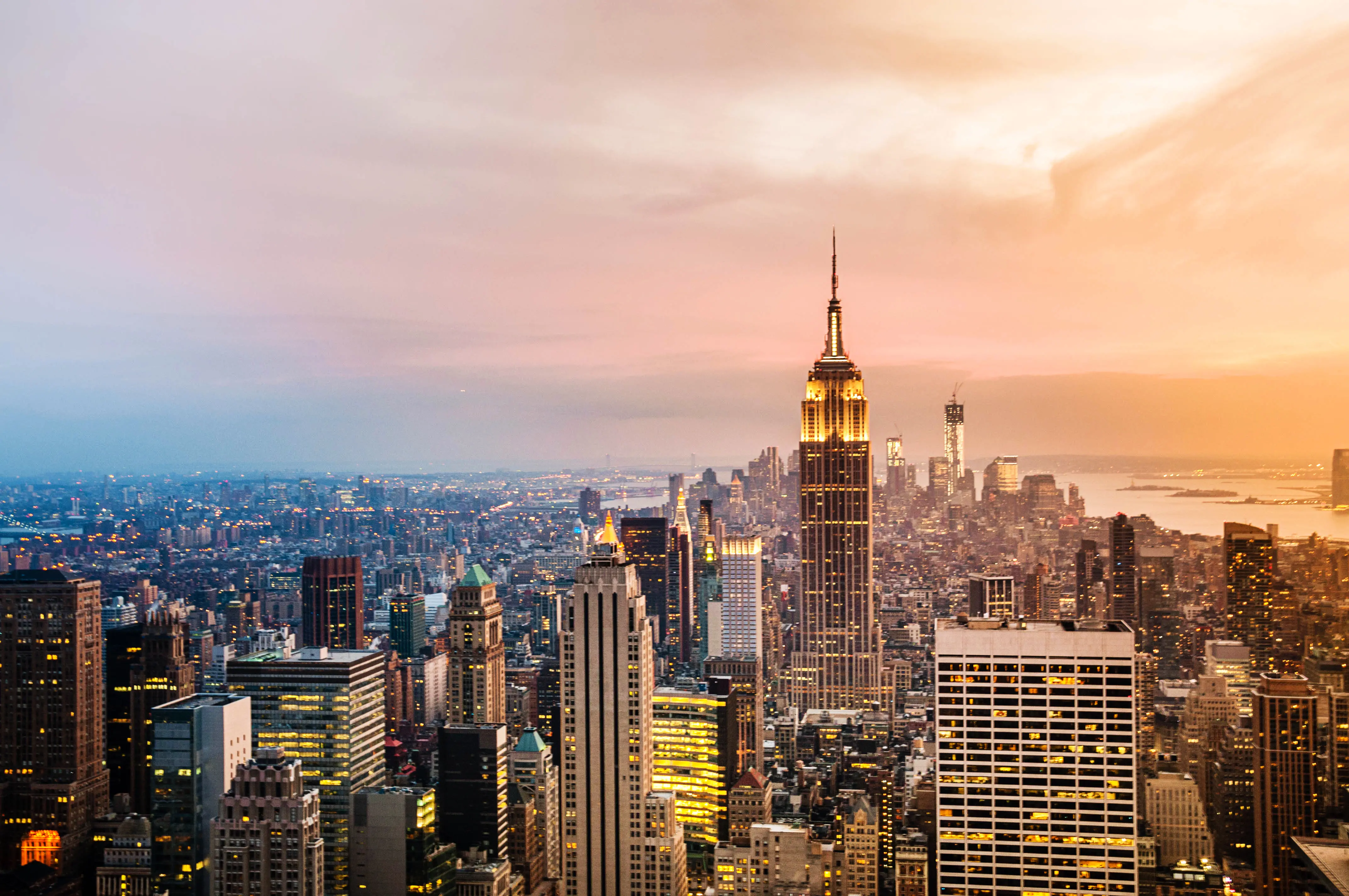 New York City skyline with urban skyscrapers at sunset