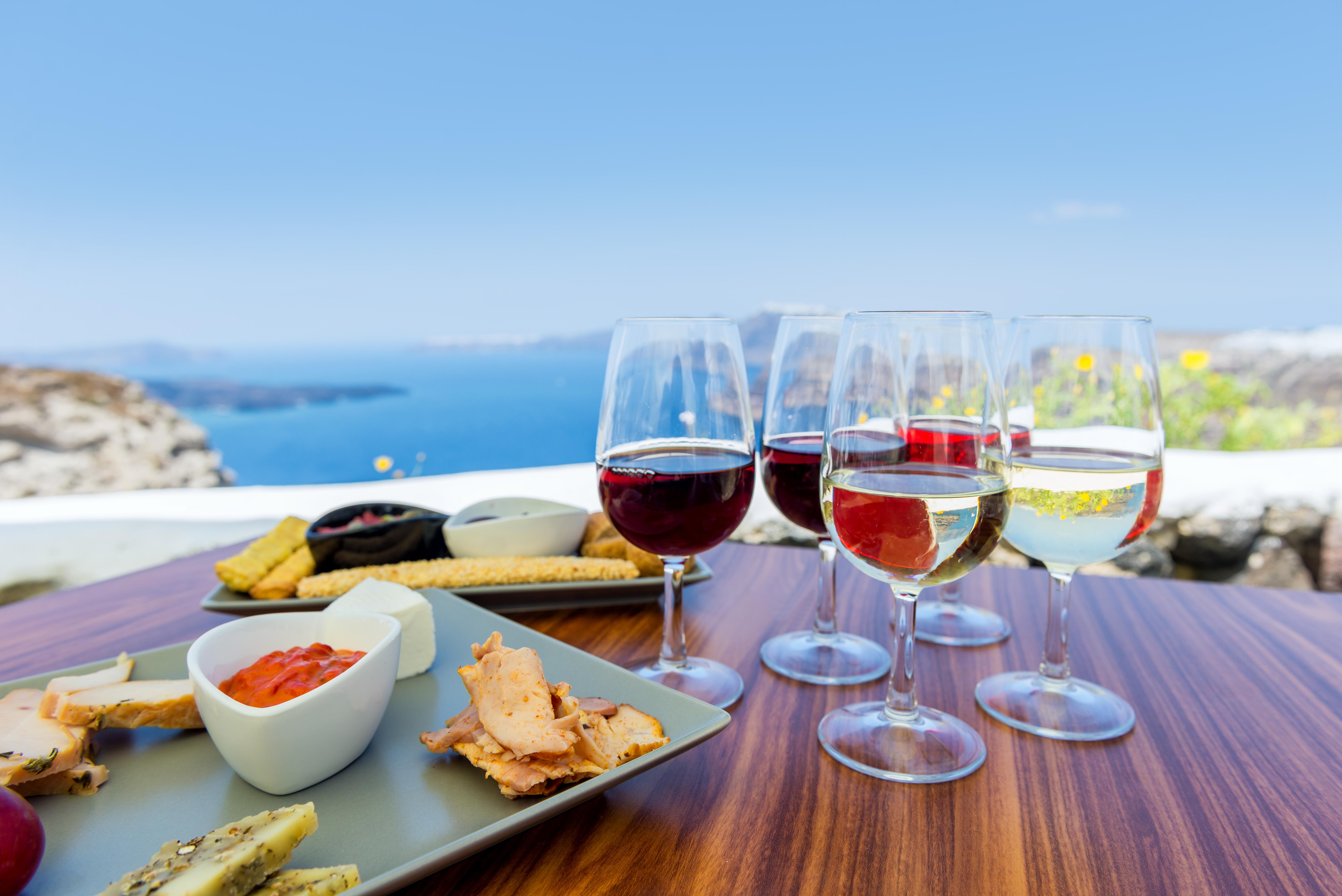 Photo of a glass of wine in Santorini, Greece