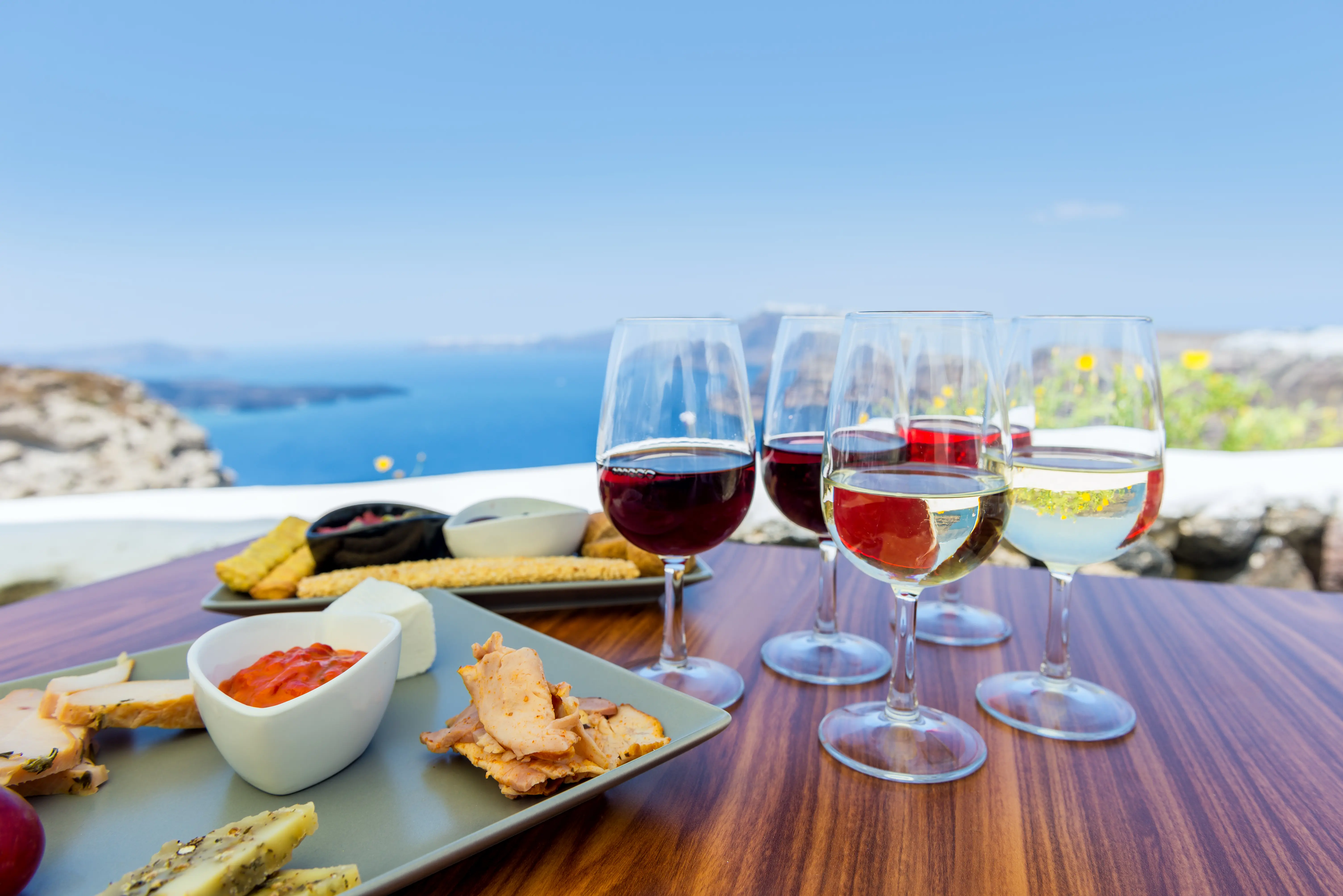 Photo of a glass of wine in Santorini, Greece