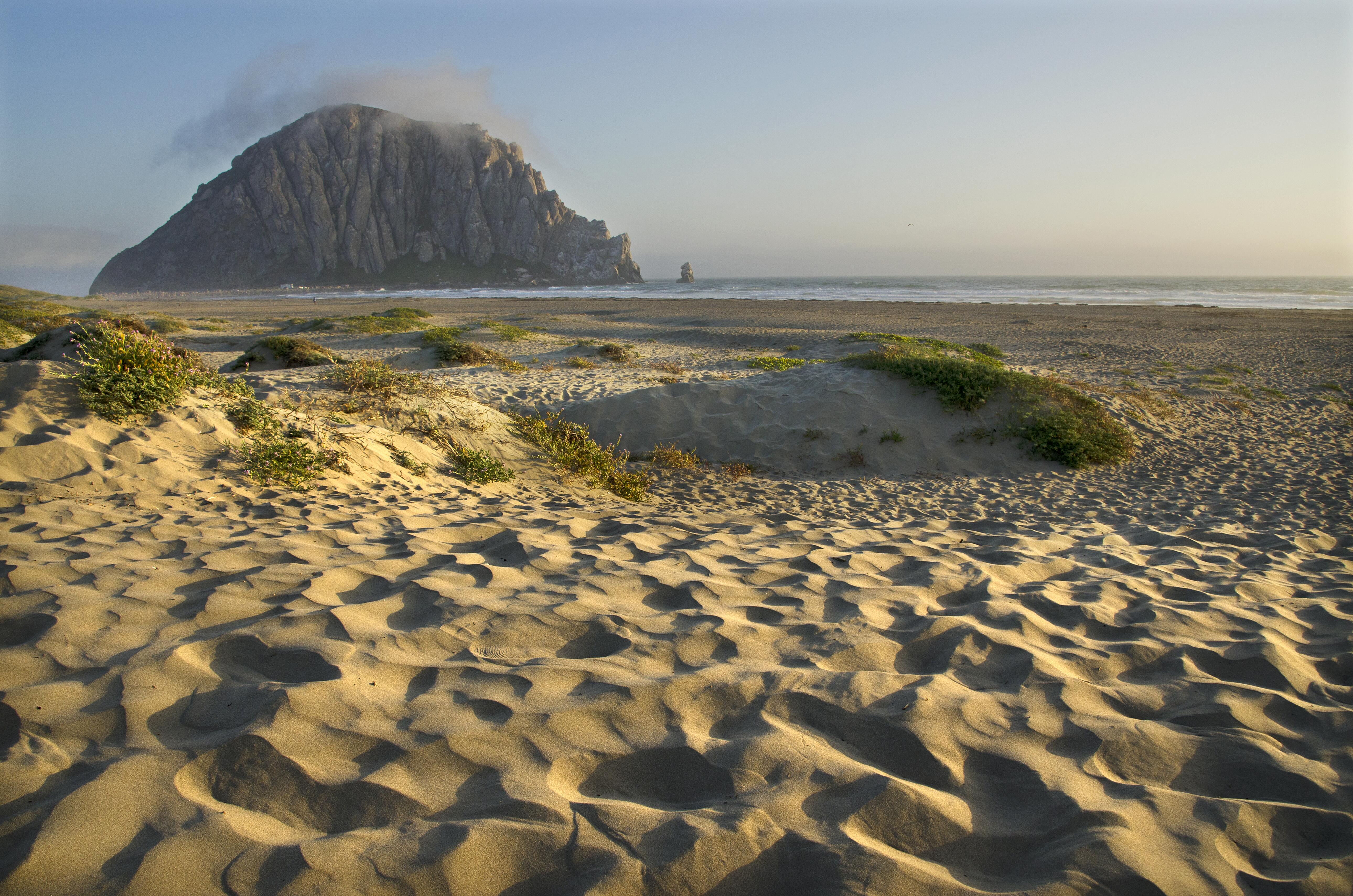 Image of Morro Rock, at Morro Rock Beach in Morro Bay, California.