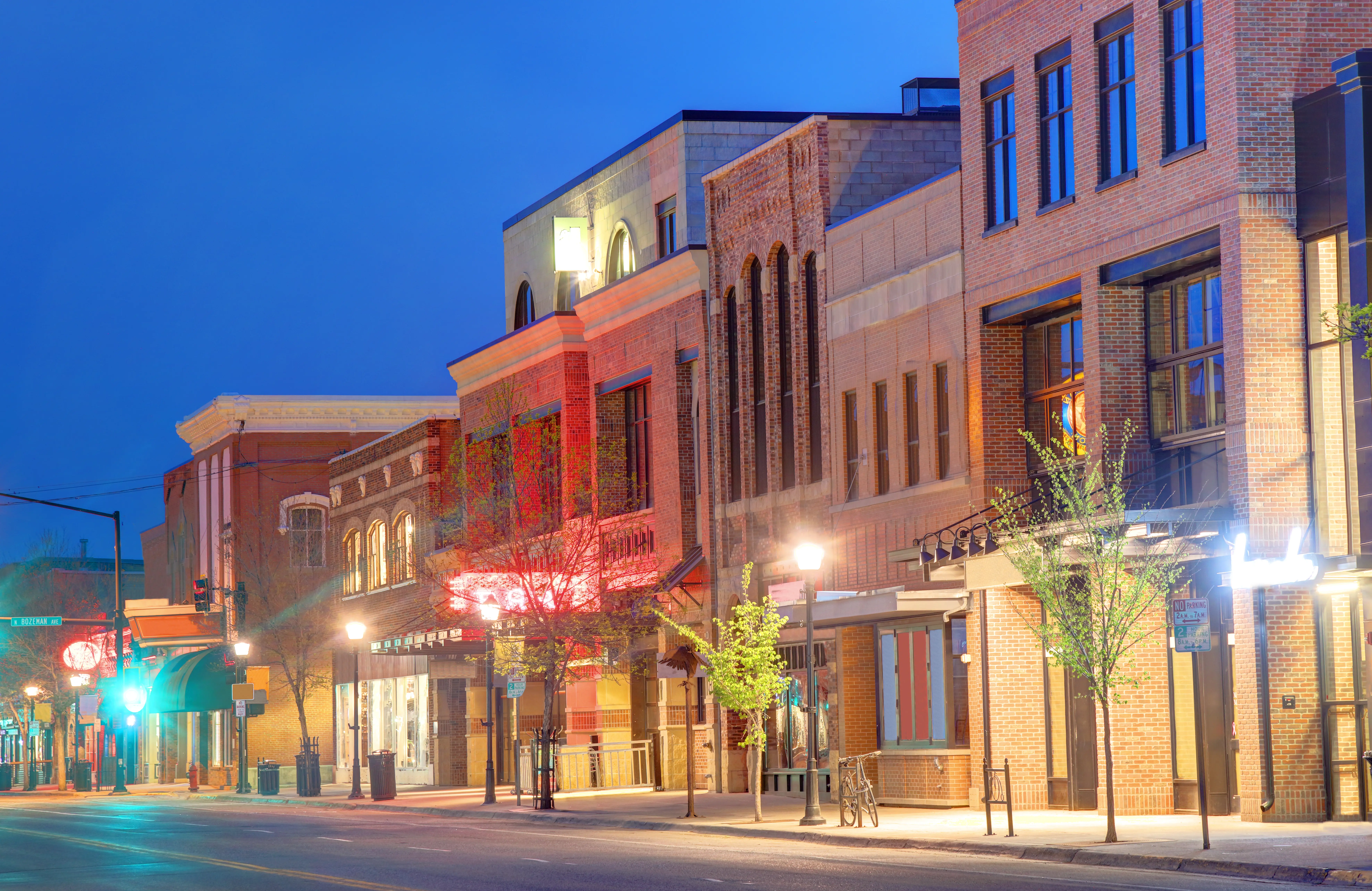 Evening view of downtown Bozeman row of buildings featuring a blend of Old West and contemporary elements, Montana