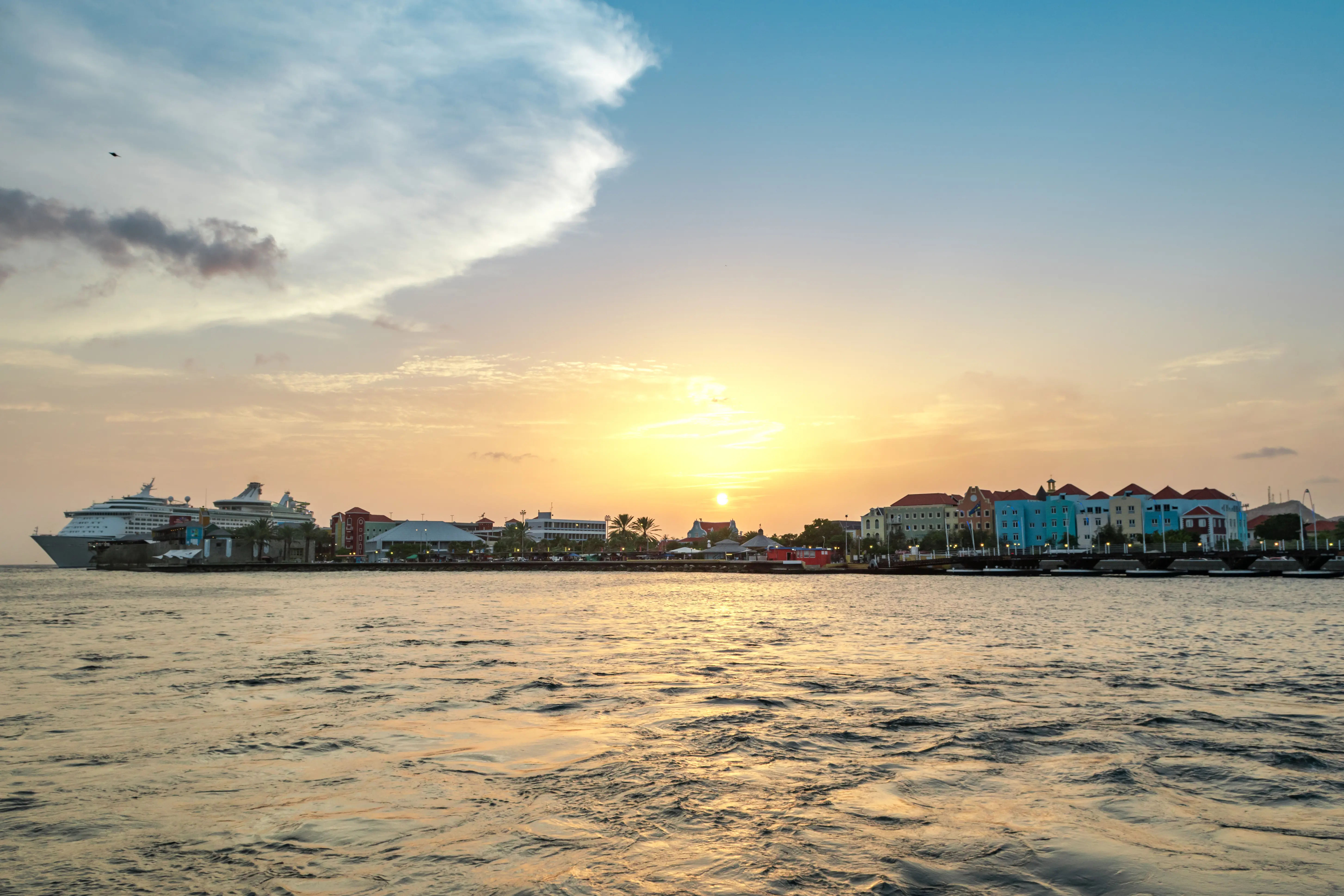 Image of the Curacao Willemstad Cruise Terminal at sunsent.