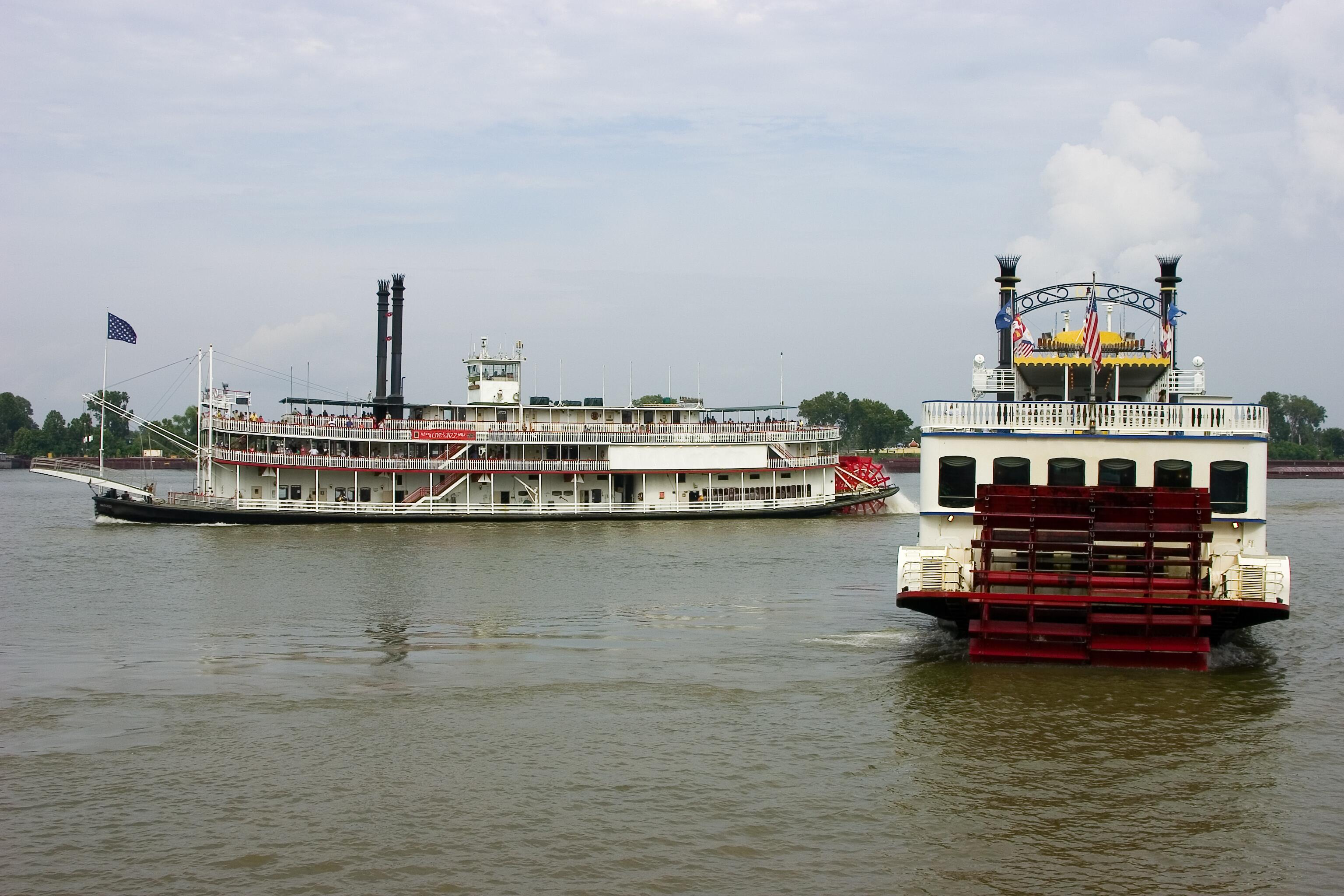 Images of two river boat steamers on the Mississippi River.