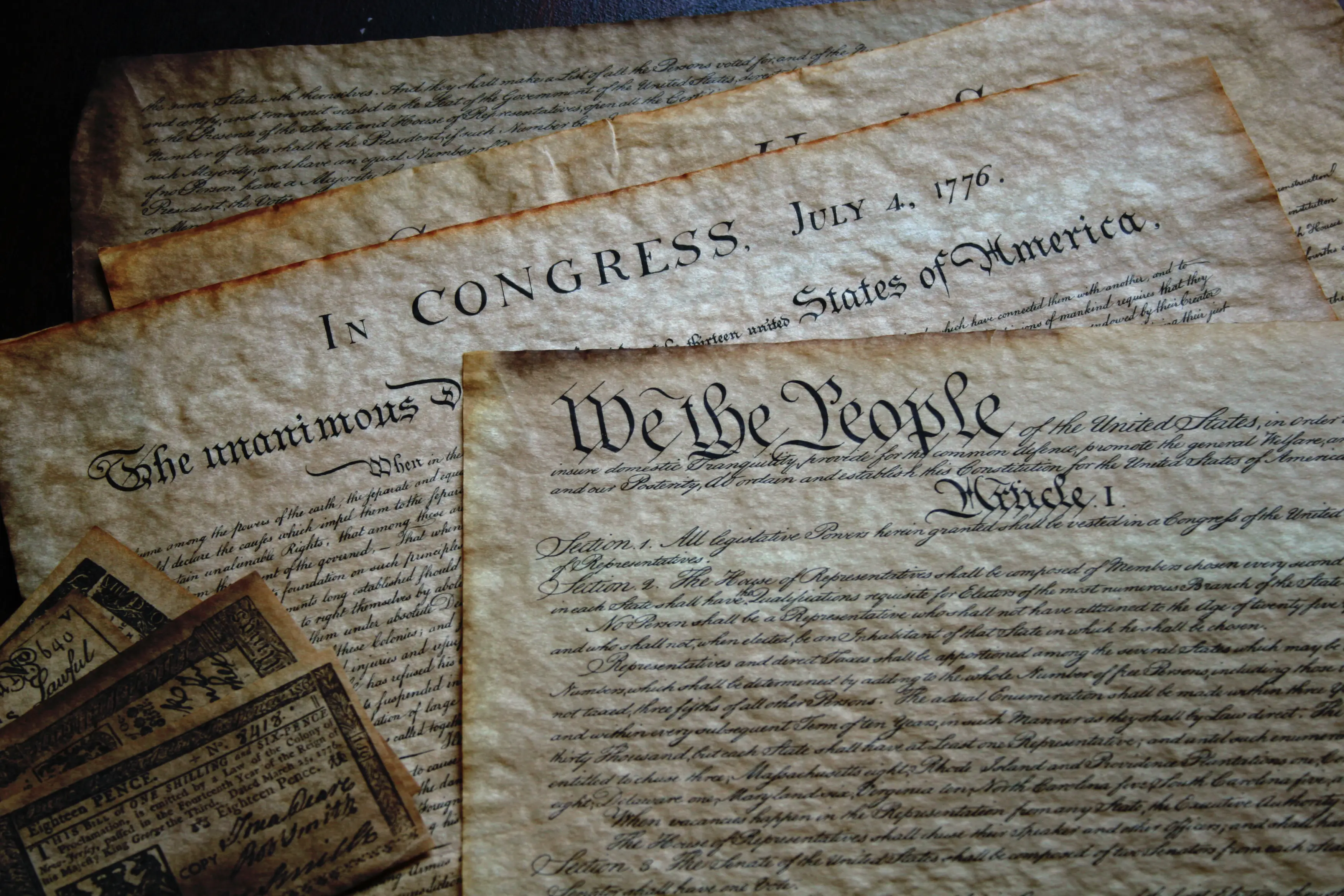 Image of an antique copy of the Declaration of Independence, Bill of Rights and the Constitution.