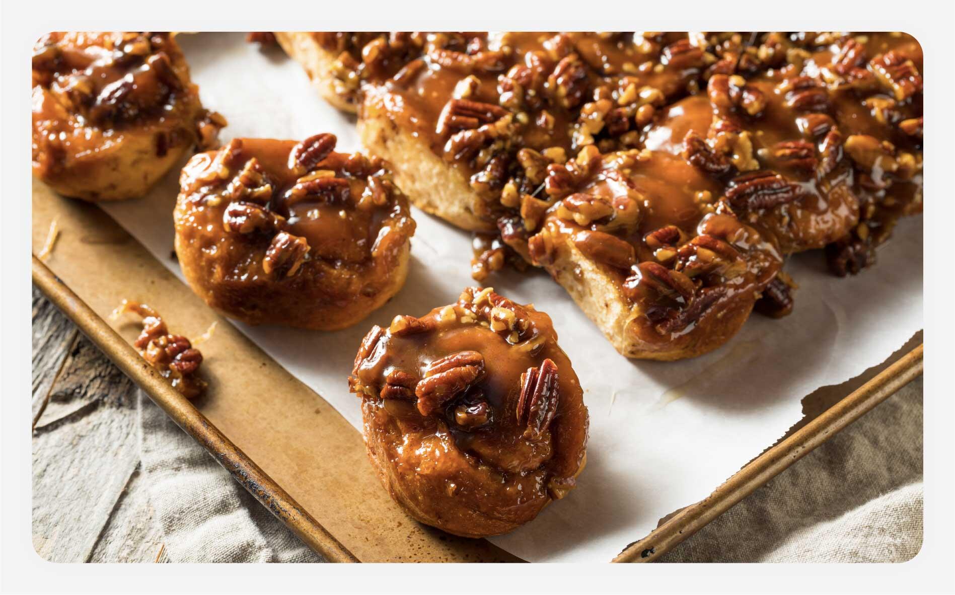 A baking sheet with freshly baked sticky buns