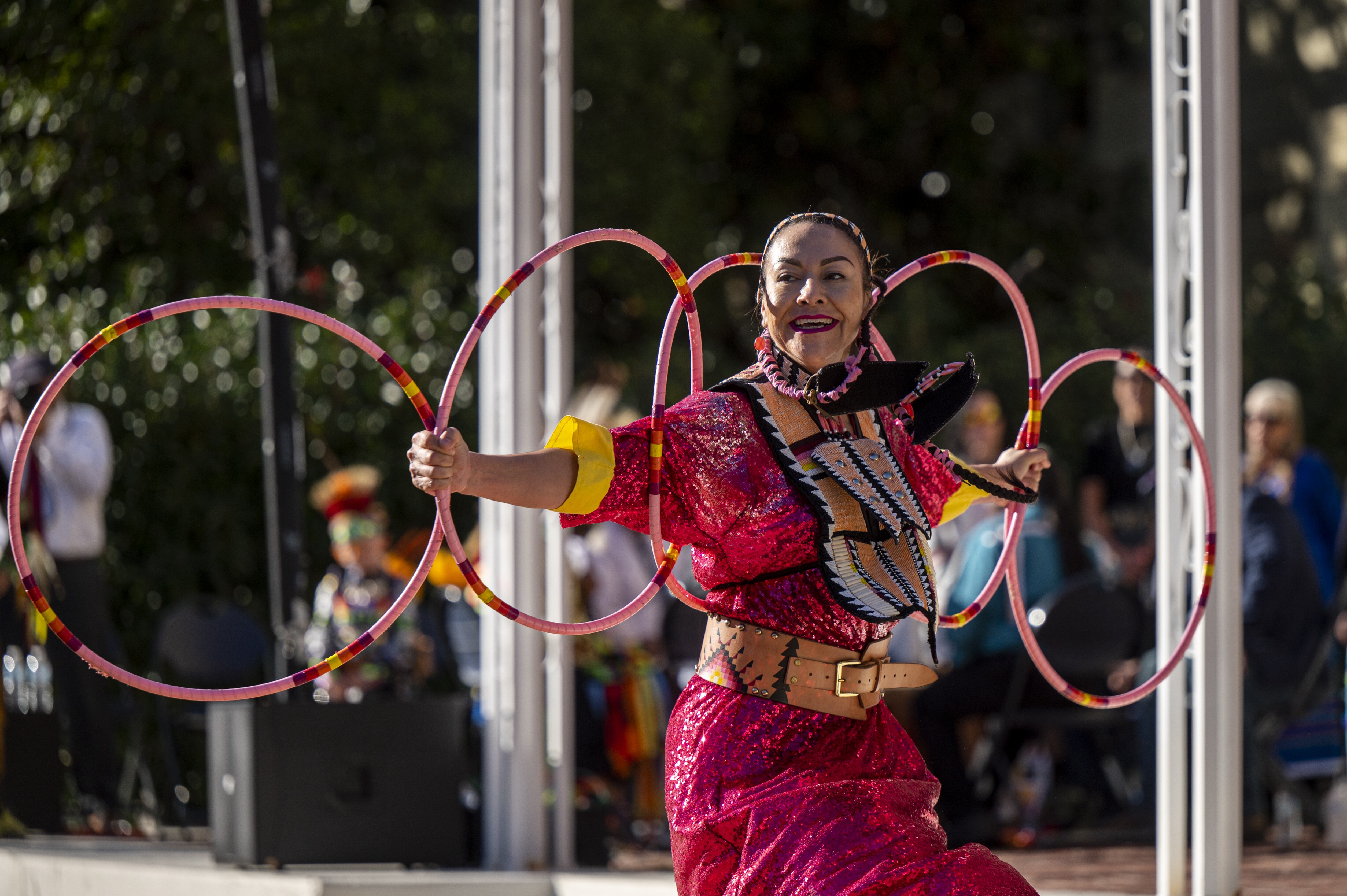 Image of Angela Gladue performing a Native American hoop dance.