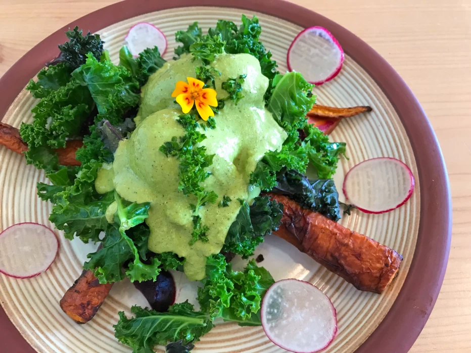 Kale and cabbage caesar salad at Nourish Kitchen and Cafe, Victoria, British Columbia.