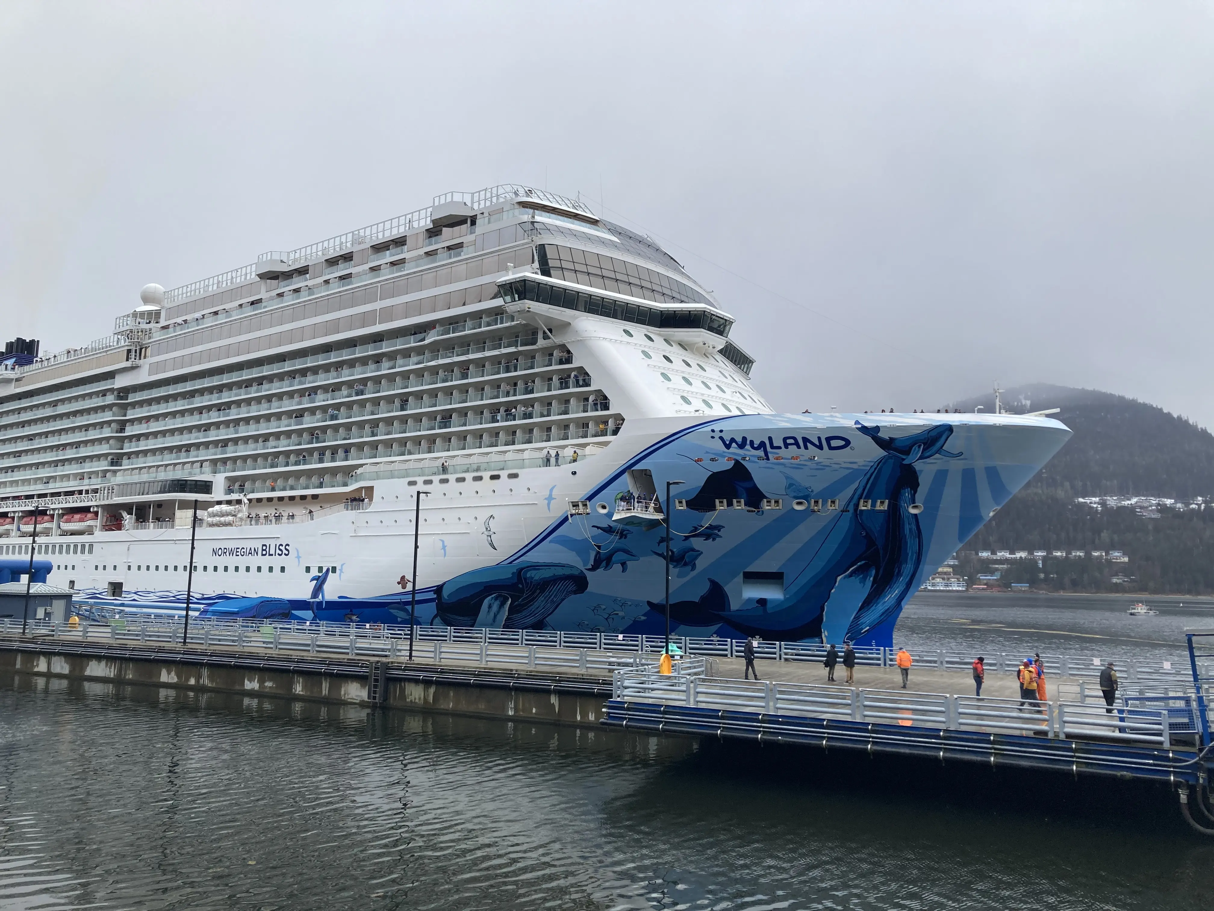 Image of the Norwegian Bliss cruise ship docking in Juneau, Alaska.