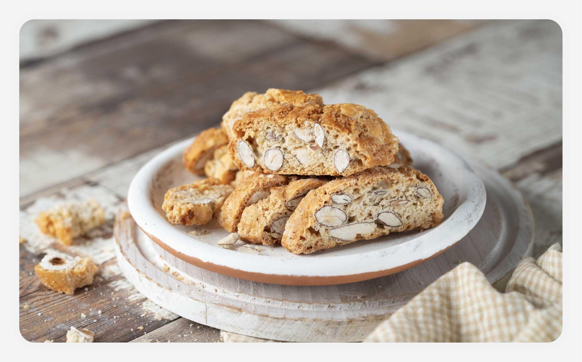 A plate of several almond biscotti.