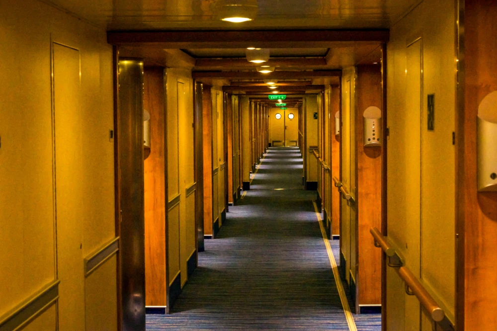 Hallway of cabins on Carnival Cruise Ship