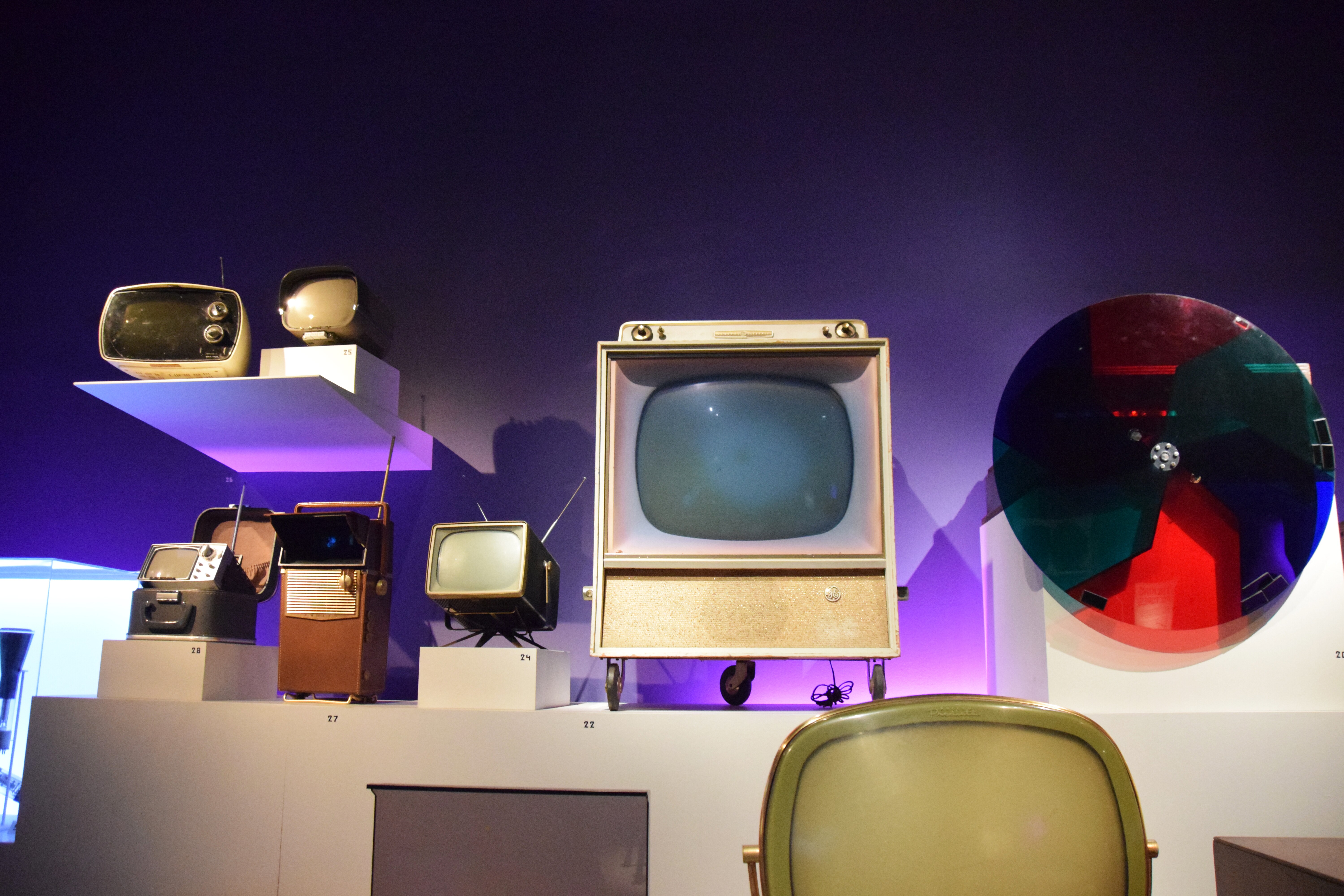 Image of various older televisions on display at the Museum of the Moving Image, New York.