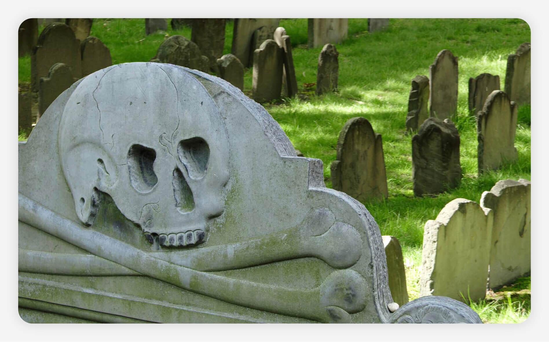 A headstone in a historic burying ground in Boston, Massachusetts.