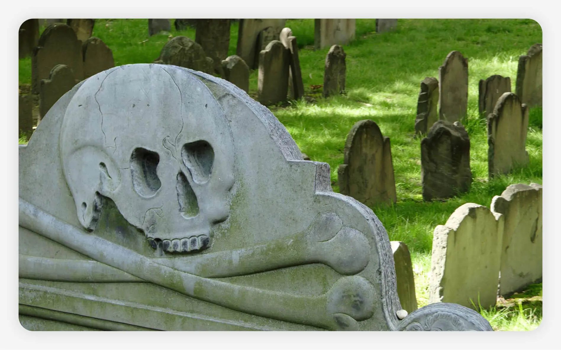 A headstone in a historic burying ground in Boston, Massachusetts.