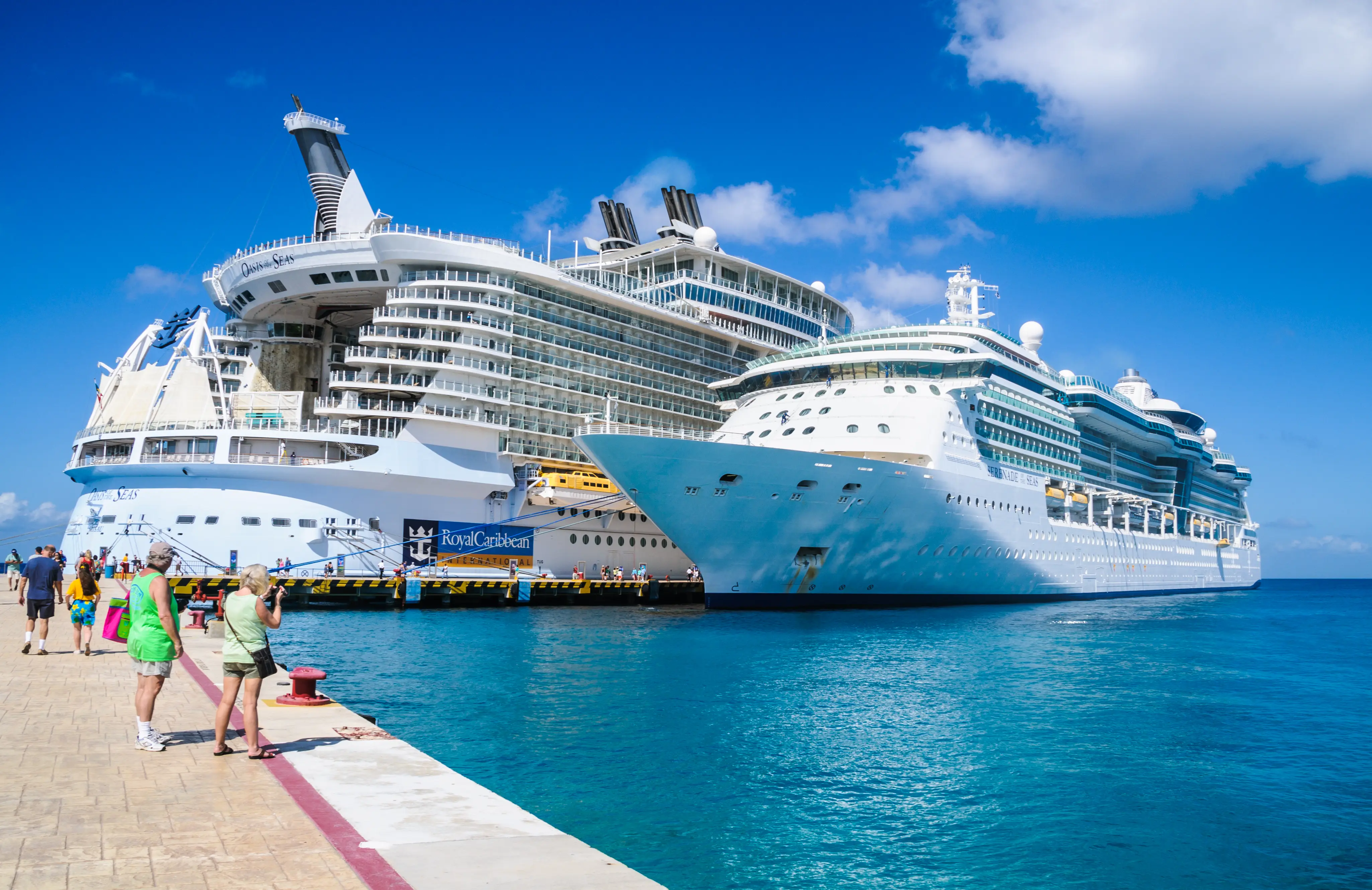 Image of two Royal Caribbean cruise ships docked in Cozumel, Mexico.