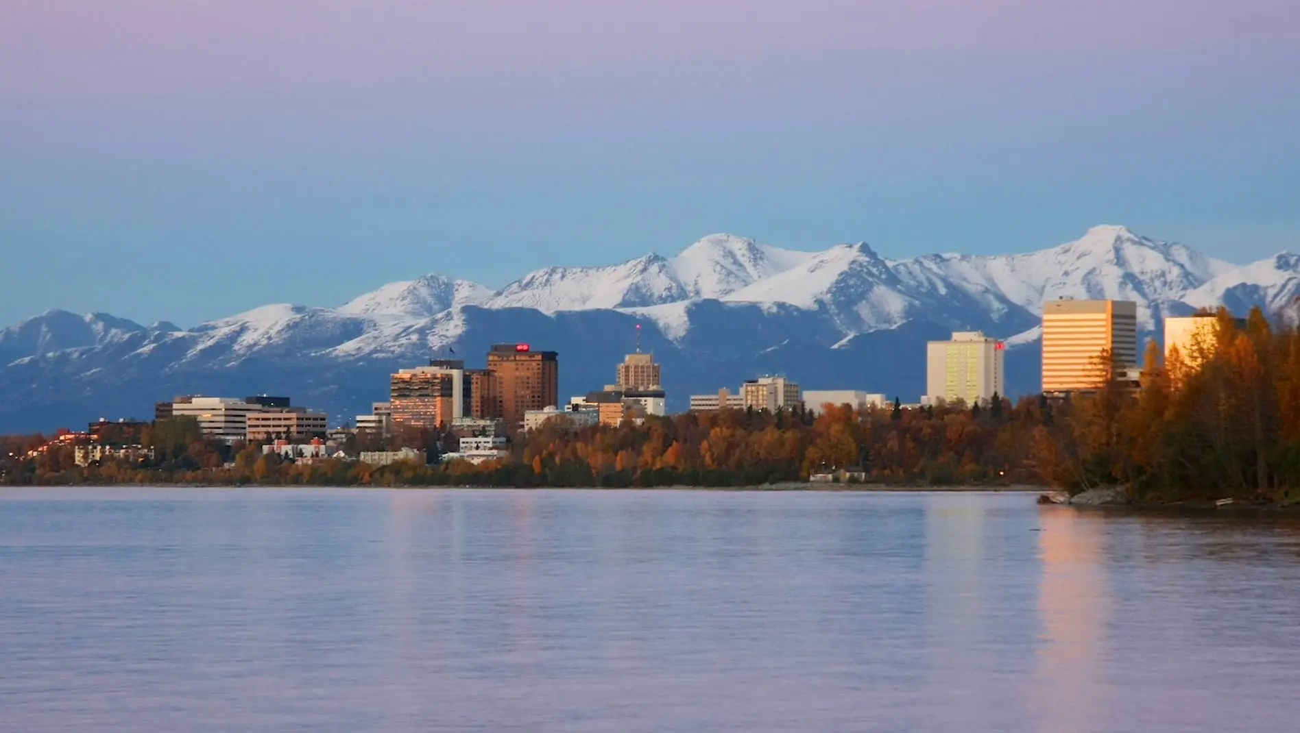 View of Anchorage with snow-capped mountains in the background